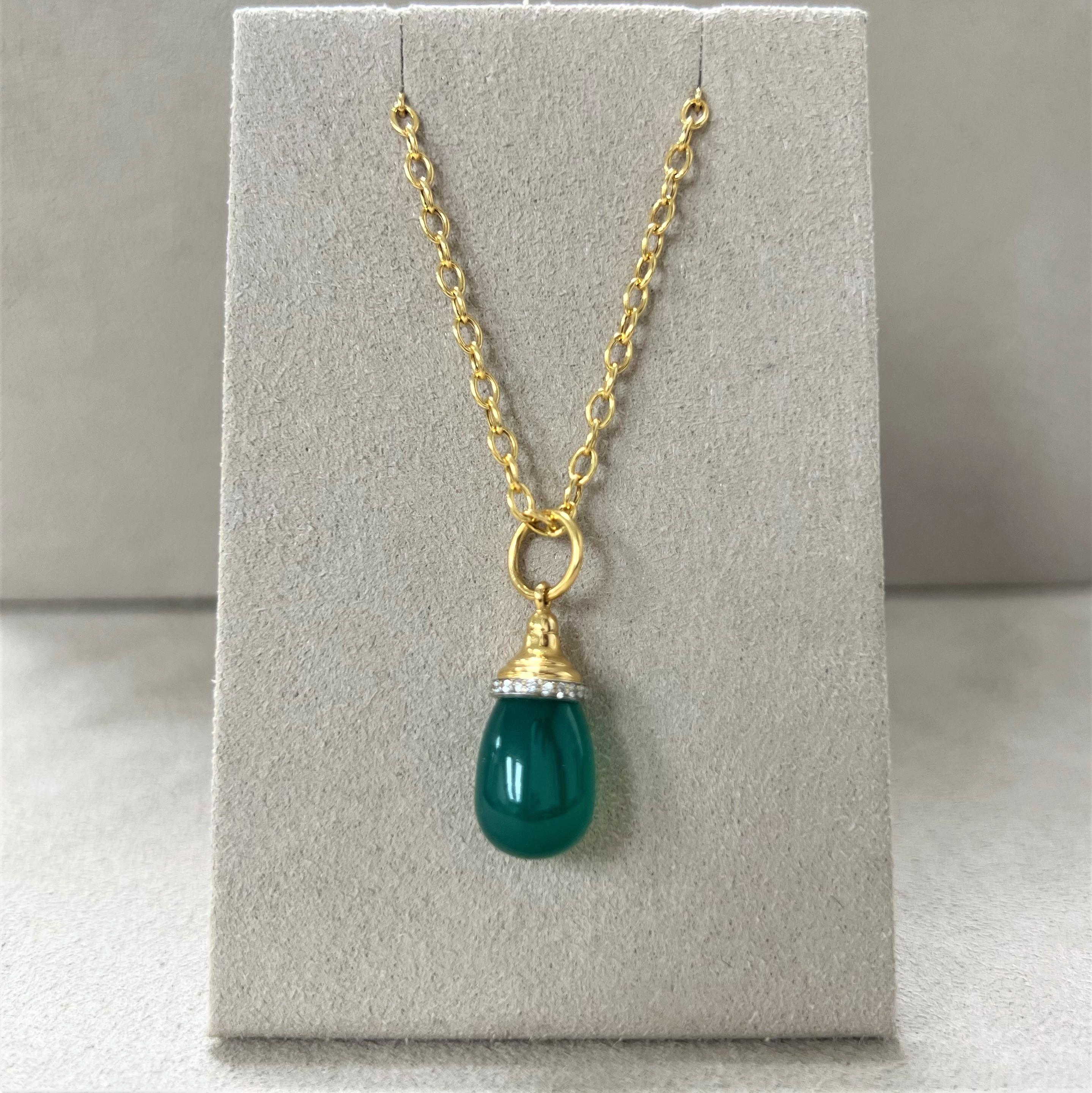 Created in 18 karat yellow gold 
Green chalcedony 10 carats minimum
Diamonds 0.10 carat approx.
Chain sold separately

Exquisitely handcrafted with 18 karat yellow gold, this statement piece boasts a 10 carat minimum of lush green chalcedony and