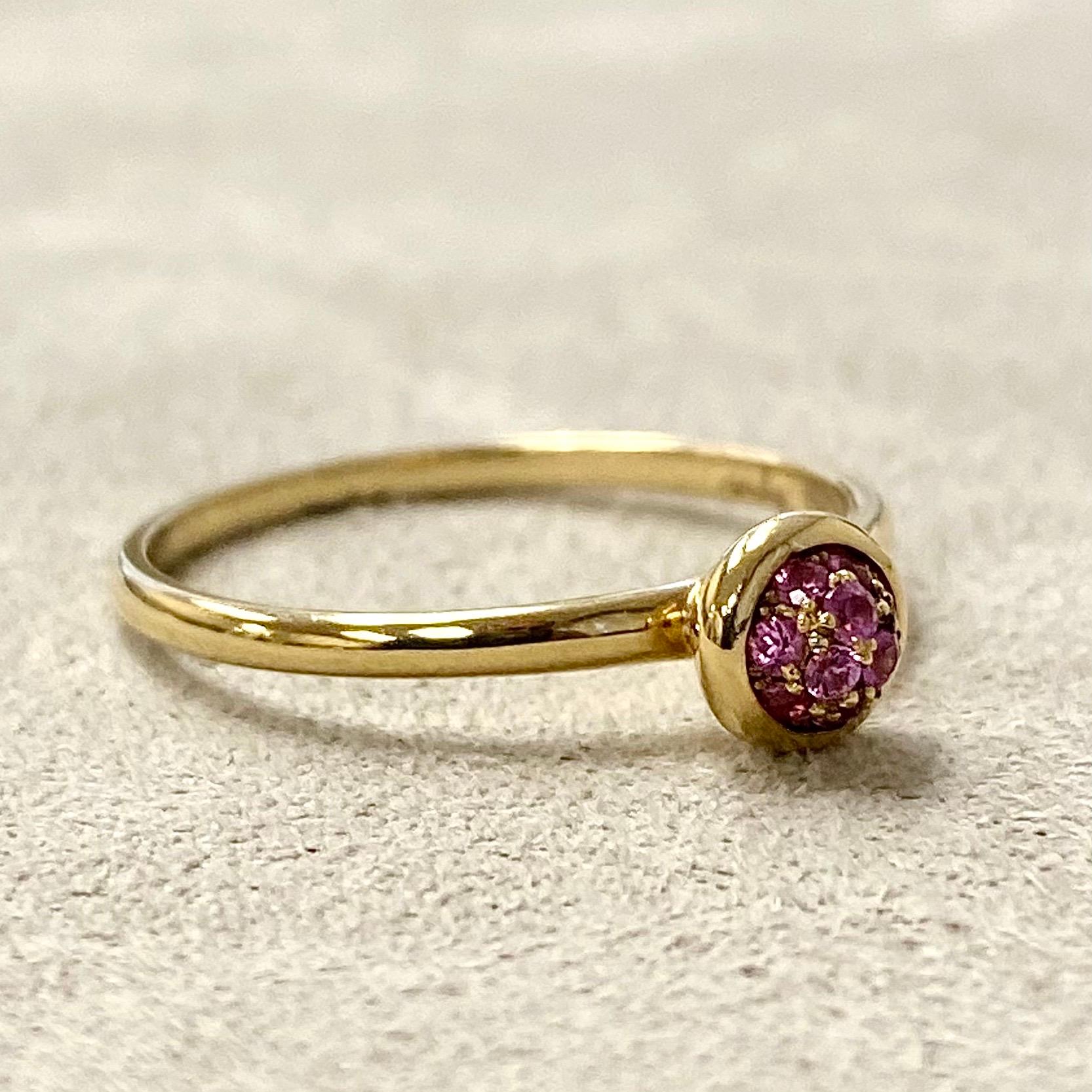 Created in 18 karat yellow gold
Pink sapphires 0.10 carat approx.
Pink sapphire pave ring 5 mm diameter approx.
Ring size US 6.5, can be sized upon request.

Crafted in 18 karat luminous yellow gold, this dazzling ring boasts 0.10 carats of