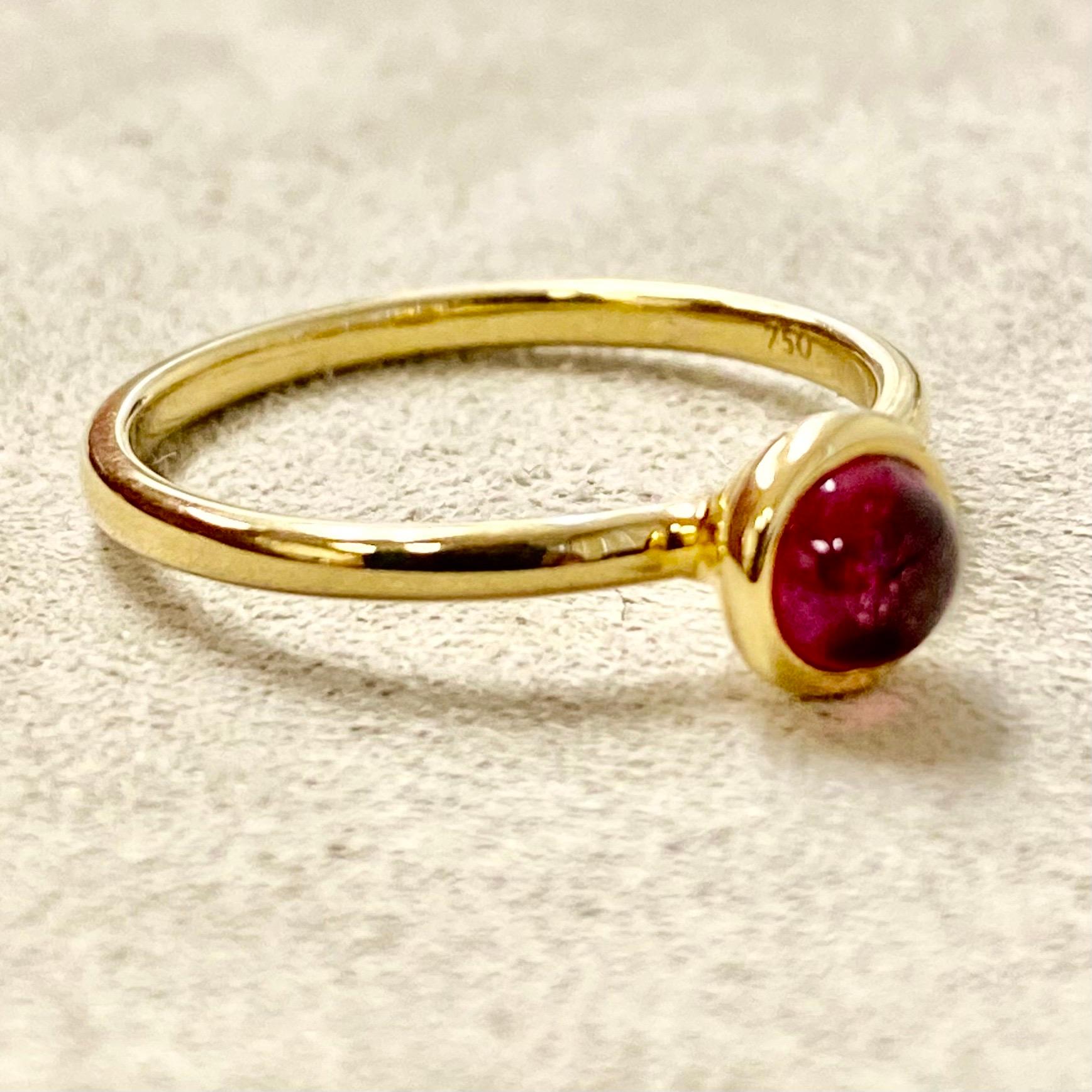Created in 18 karat yellow gold
Rubellite cabochon
Ring size US 6.5, can be sized upon request.

Handcrafted in 18 karat golden alloy, this exquisite ring features a Rubellite cabochon and is designed to size US 6.5; however, it can be tailored to