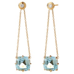 Syna Boucles d'oreilles Mogul en or jaune avec topaze bleue et diamants champagne