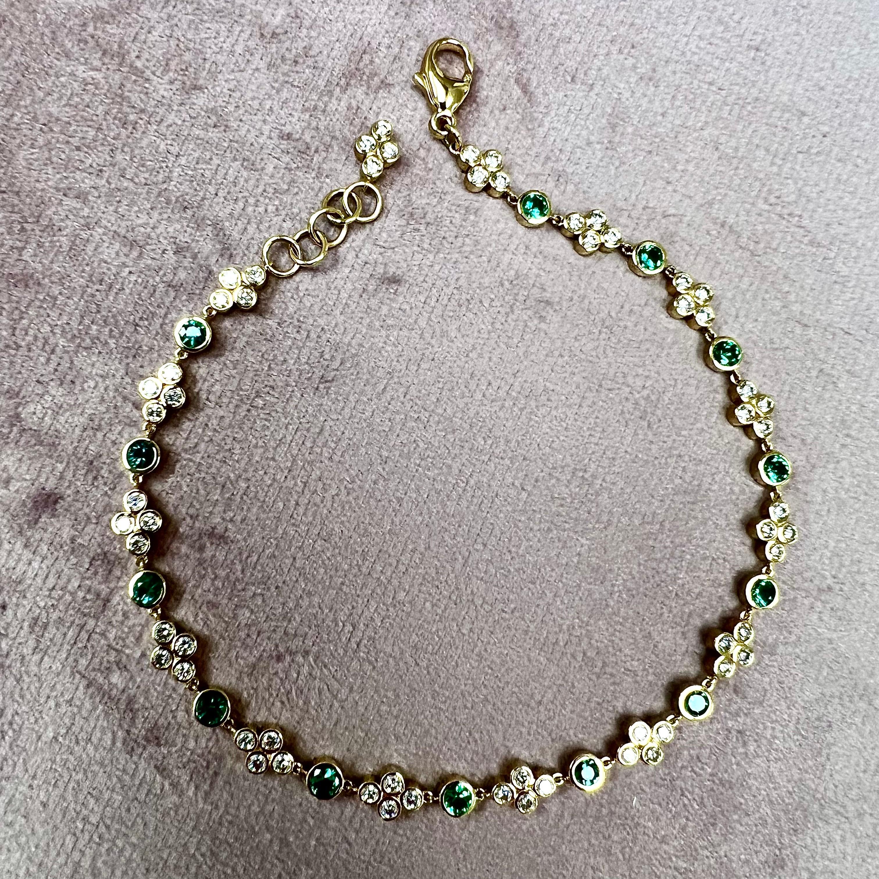Created in 18 karat yellow gold
Emeralds 1.20 carats approx.
Diamonds 1.50 carats approx.
8 inch length with lobster clasp
Bracelet can be clasped at any length

Handcrafted from 18 karat yellow gold, this bracelet features emeralds estimated at