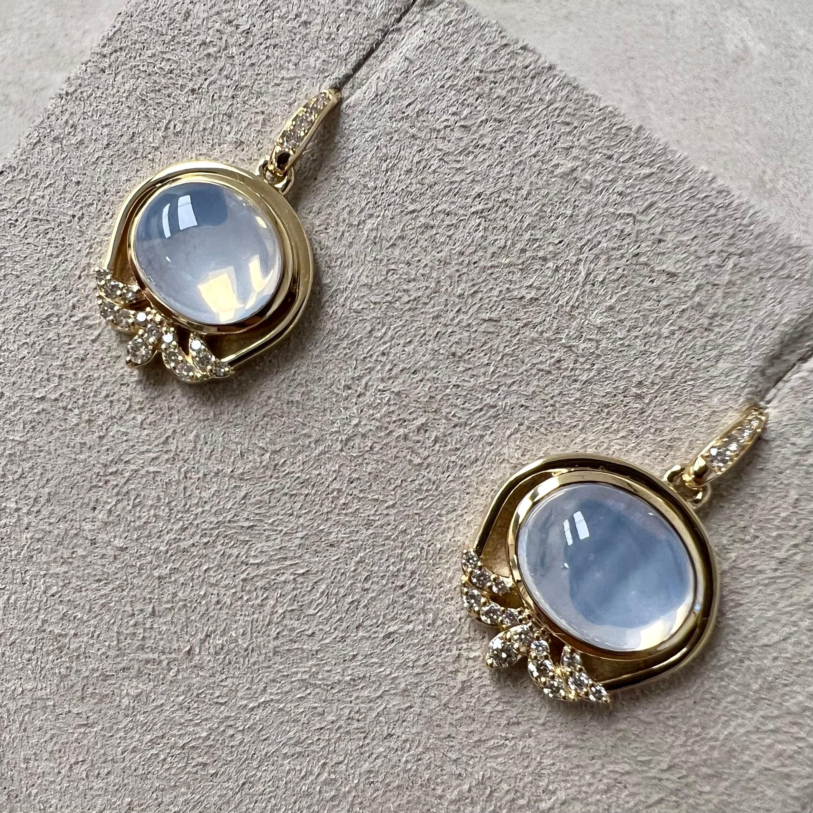Created in 18 karat yellow gold
Moon quartz 7.50 carats approx.
Diamonds 0.25 carat approx.
French wire for pierced ears
Limited Edition

These exquisite Candy Blue Topaz and Lemon Quartz Sugarloaf Earrings are of the finest quality, created in 18