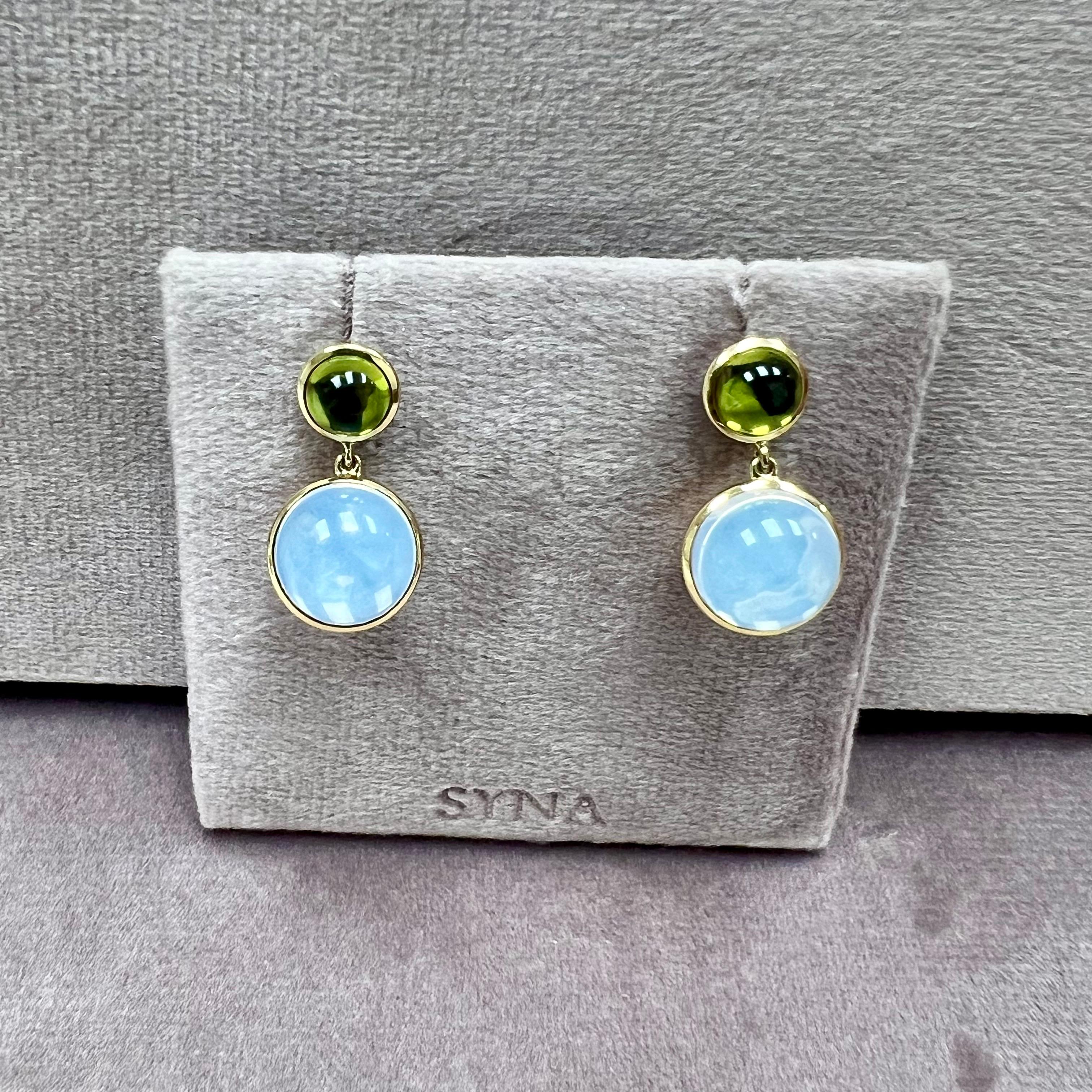 Created in 18 karat yellow gold
Moon quartz 11 carats approx.
Peridot 2.50 carat approx.
Post back for pierced ears
Limited Edition

Crafted from 18 karat yellow gold, these limited-edition earrings feature 11 carats of moon quartz and 2.5 carats of