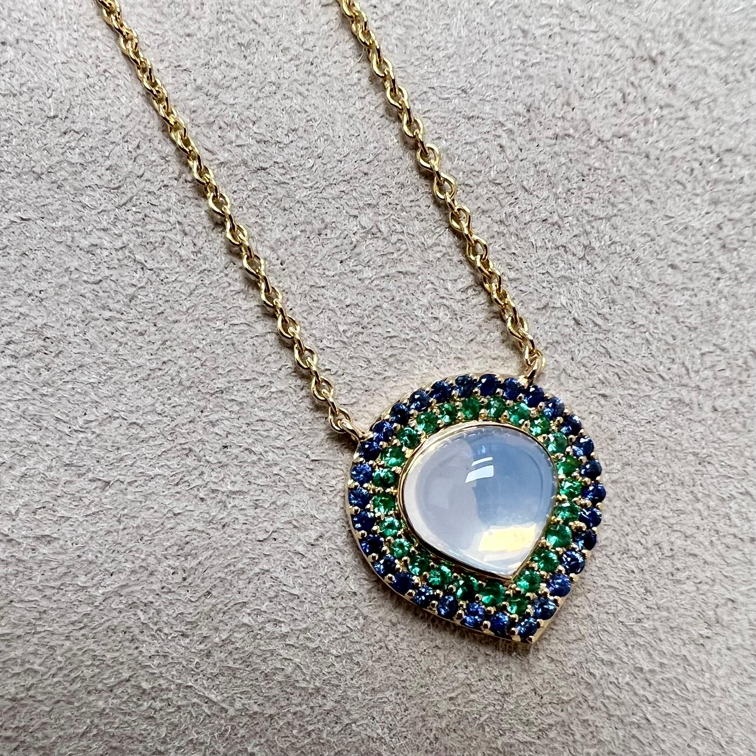 Created in 18 karat yellow gold
Moon quartz 2.50 carats approx.
Emeralds 0.20 carat approx.
Blue sapphires 0.40 carat approx.
18 inch chain with loops at 16 & 17th inch
18 kyg lobster lock

About the Designers ~ Dharmesh & Namrata

Drawing