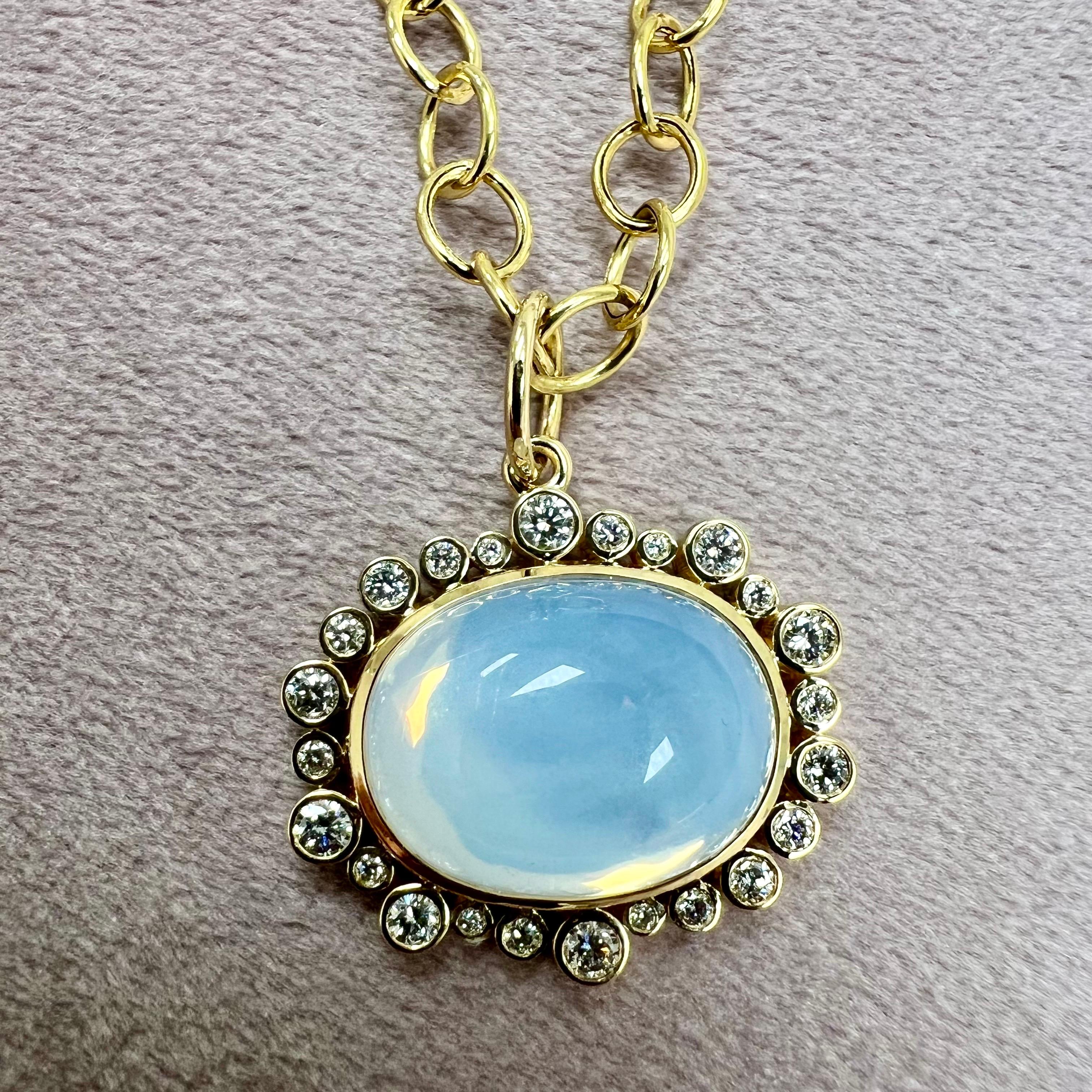 Created in 18 karat yellow gold
Moon Quartz 11.50 carats approx.
Diamonds 0.50 carats approx.
Chain sold separately

 About the Designers ~ Dharmesh & Namrata

Drawing inspiration from little things, Dharmesh & Namrata Kothari have created an