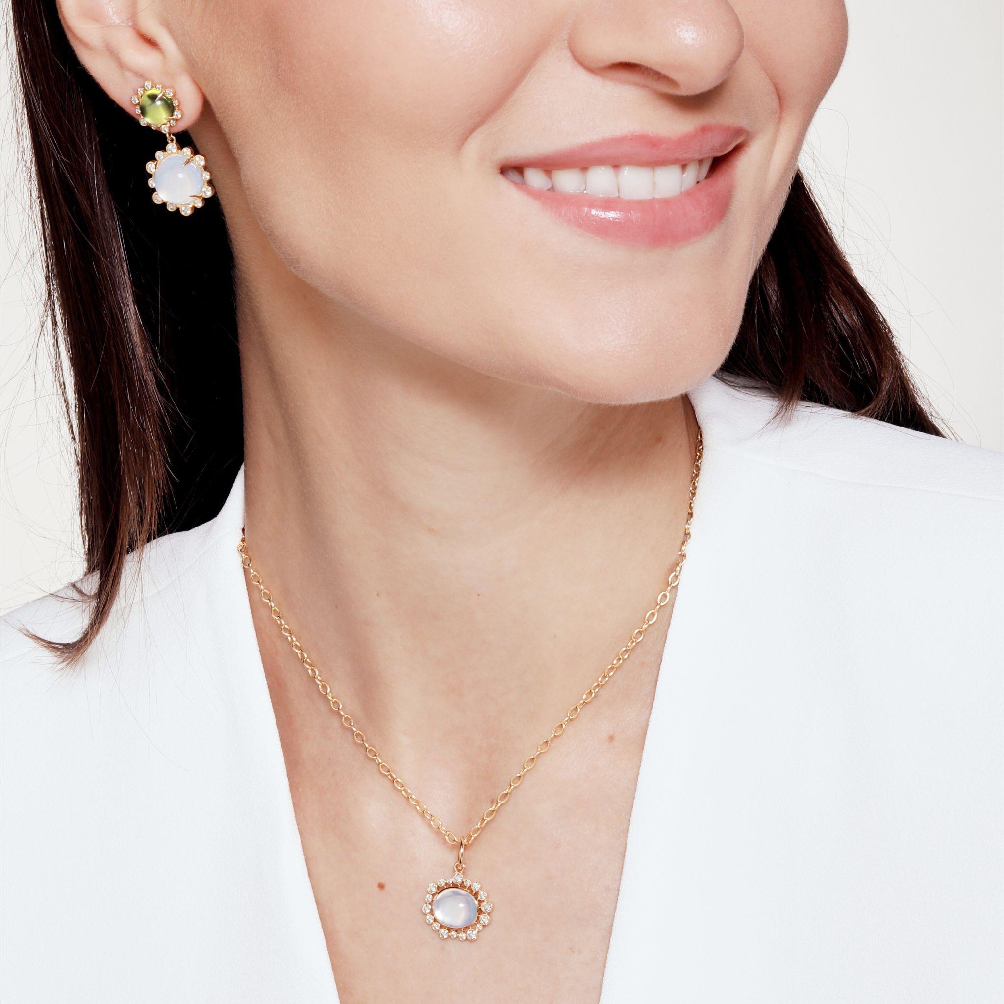 Created in 18 karat yellow gold
Moon Quartz 3.50 carats approx.
Diamonds 0.40 carat approx.
Chain sold separately

 About the Designers ~ Dharmesh & Namrata

Drawing inspiration from little things, Dharmesh & Namrata Kothari have created an