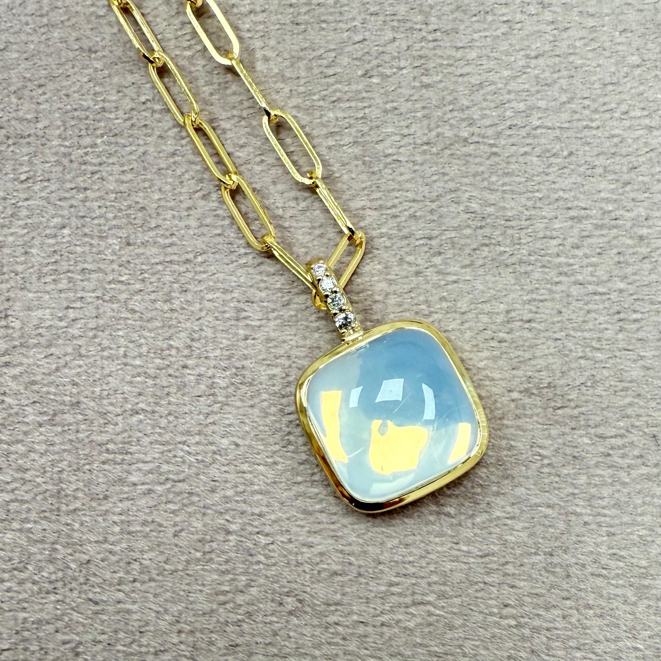 Created in 18 karat yellow gold
Moon Quartz 5.50 carats approx.
Diamonds 0.02 carat approx.
18 inch solid thin paper clip chain

 About the Designers ~ Dharmesh & Namrata

Drawing inspiration from little things, Dharmesh & Namrata Kothari have