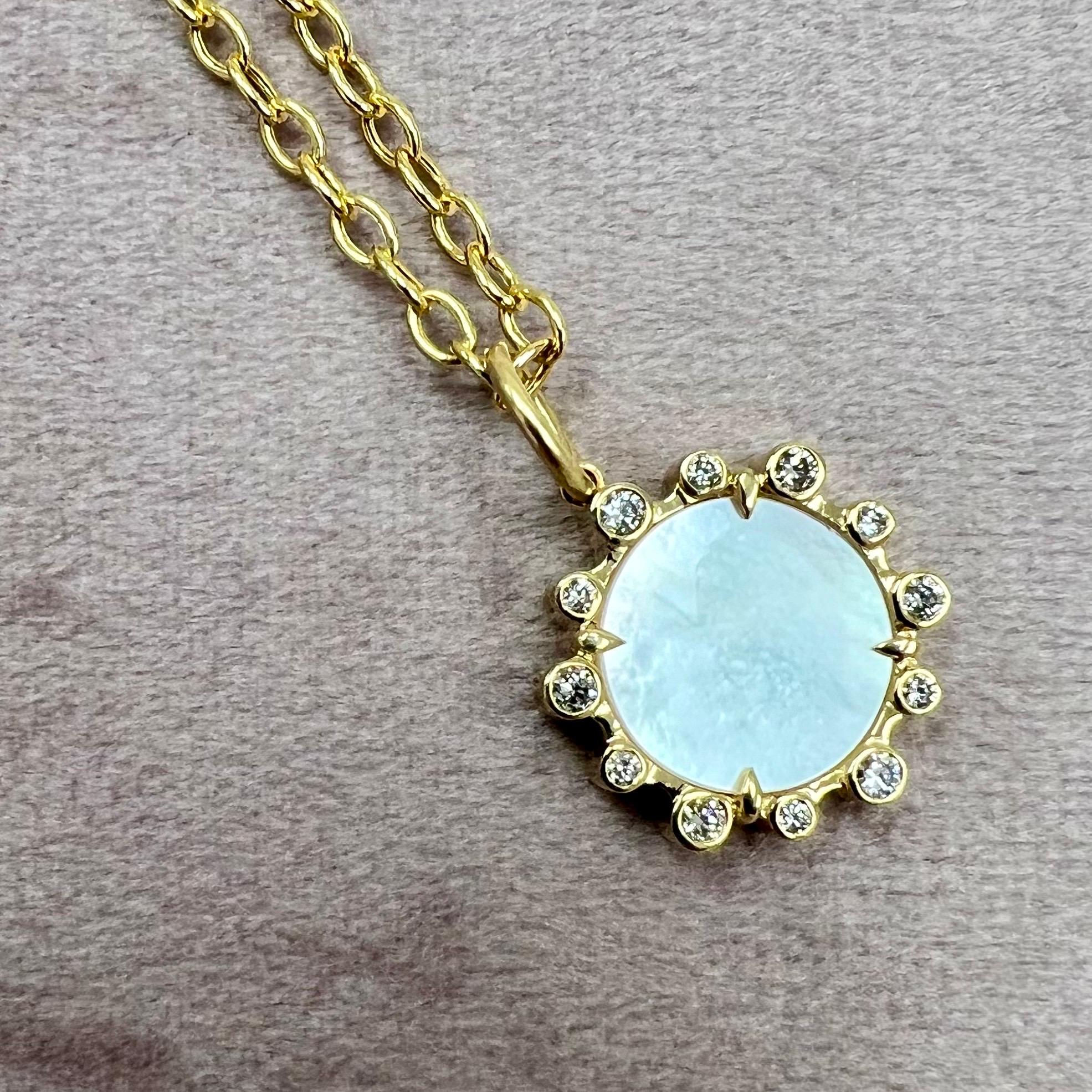 Created in 18 karat yellow gold
Mother of Pearl 2.50 carats approx.
Diamonds 0.25 carat approx.
Chain sold separately


 About the Designers ~ Dharmesh & Namrata

Drawing inspiration from little things, Dharmesh & Namrata Kothari have created an