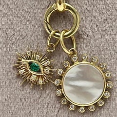 Syna Yellow Gold Mother of Pearl Sun Charm and Emerald Evil Eye Charm
