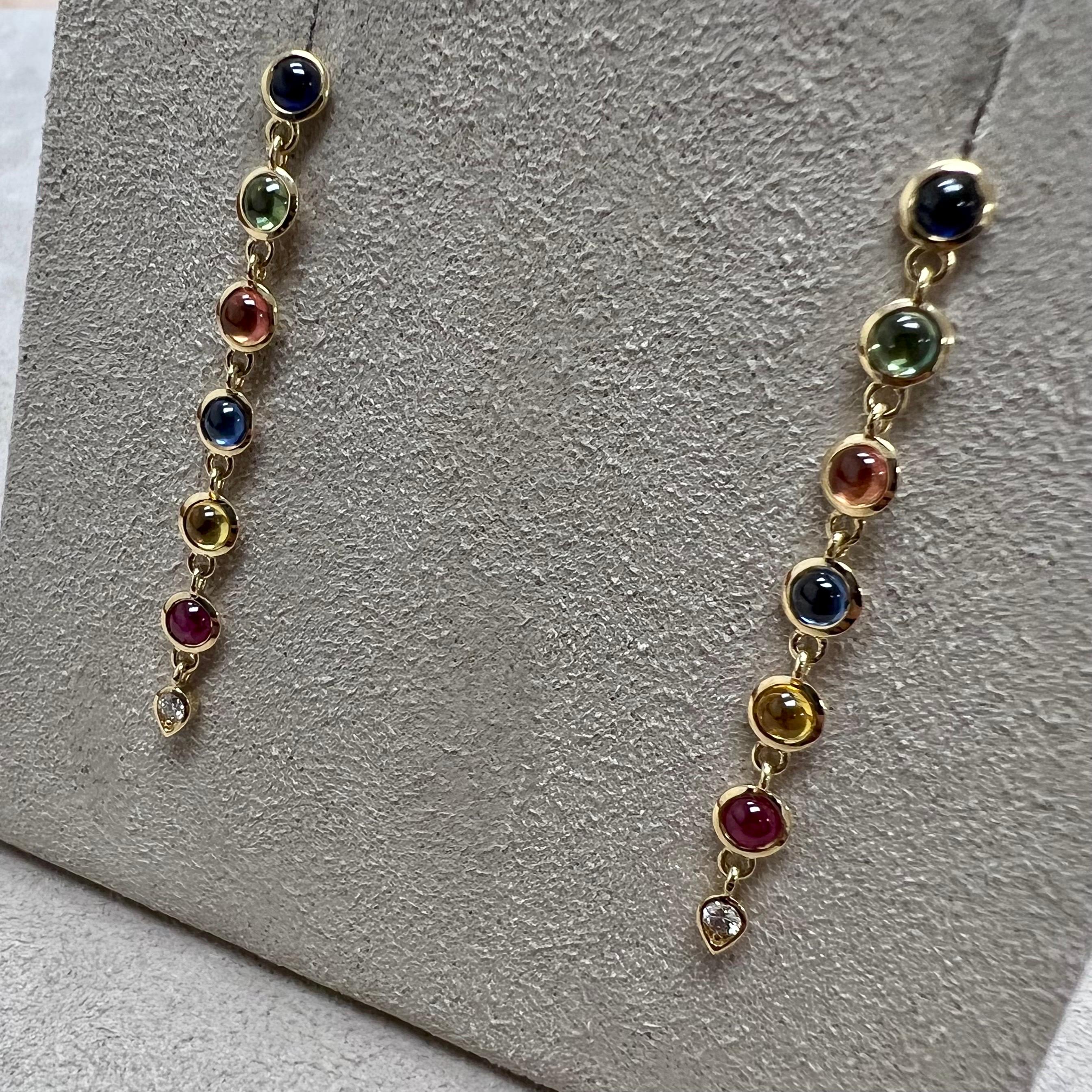 Created in 18 karat yellow gold
Multi color sapphires 1.80 carats approx.
Diamonds 0.07 carat approx.
Post backs for pierced ears
Limited edition

This limited edition Chakra Long Necklace is an exquisite piece of luxury jewelry crafted from 18