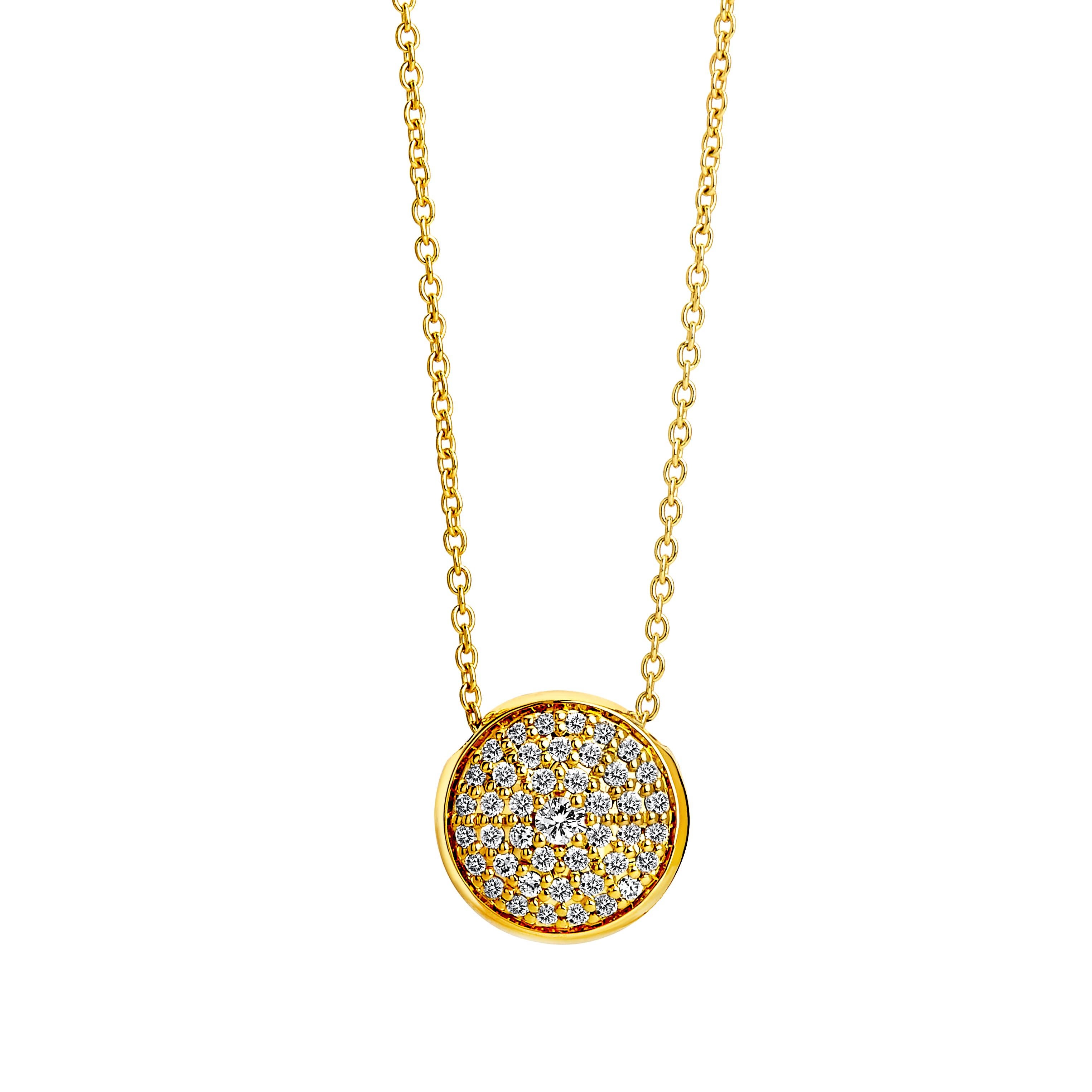 Created in 18 karat yellow gold
Black diamonds 0.35 ct approx
Diamonds 0.35 ct approx
18 inch chain with loops at 16th & 17th inch
Reversible necklace
Chain slides through the charm

Fashioned from 18 karat yellow gold, this reversible necklace