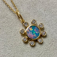 Syna-Anhänger aus Gelbgold mit Boulderopal und Diamanten