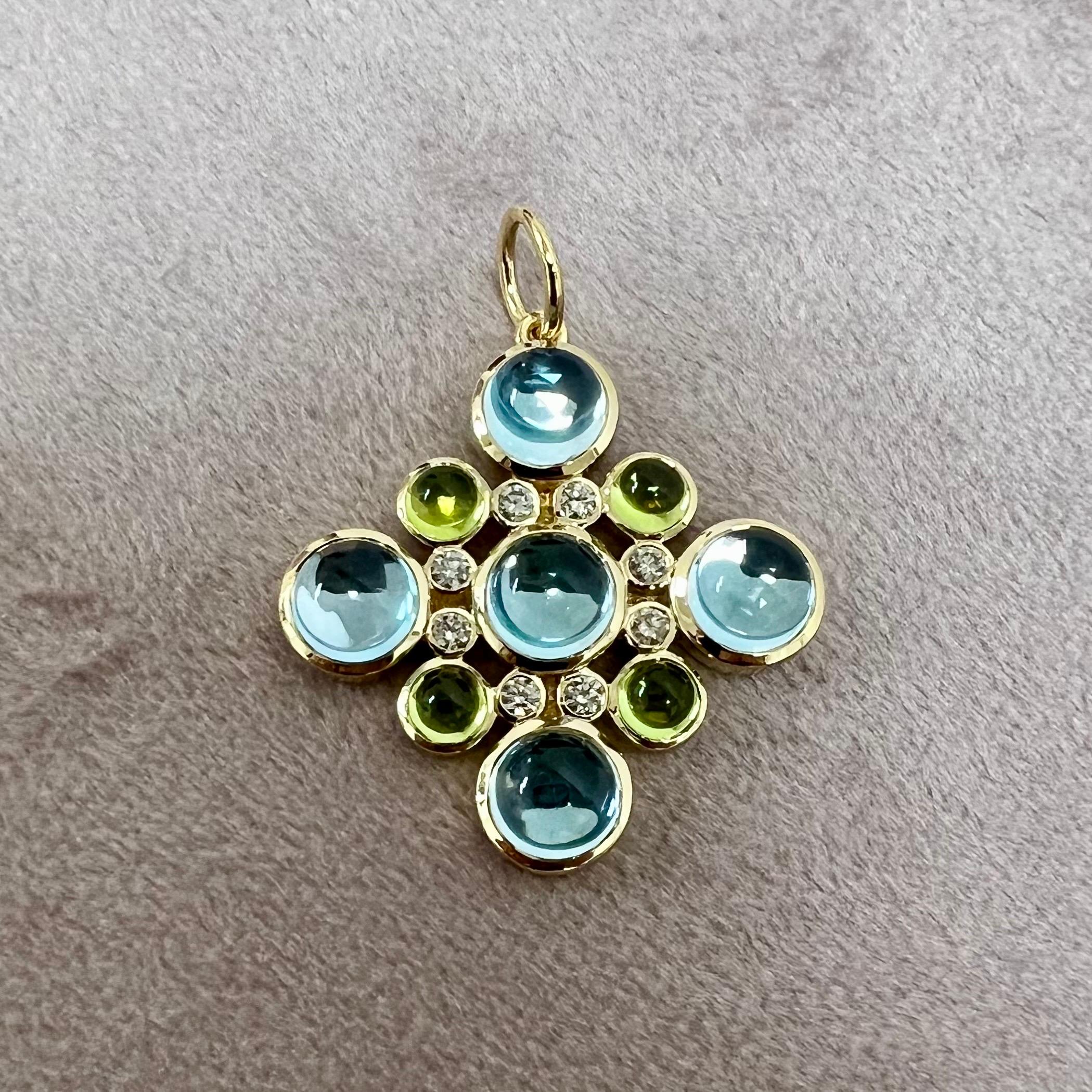 Created in 18 karat yellow gold
Peridot 1.50 carats approx.
Blue topaz 7.50 carats approx.
Diamonds 0.25 carat approx.
Chain sold separately

Enrobing 18 karat yellow gold, a Peridot of 1.50 carats, a Blue Topaz of 7.50 carats, and Diamonds of 0.25