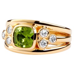 Syna, bague en or jaune avec péridot et diamants