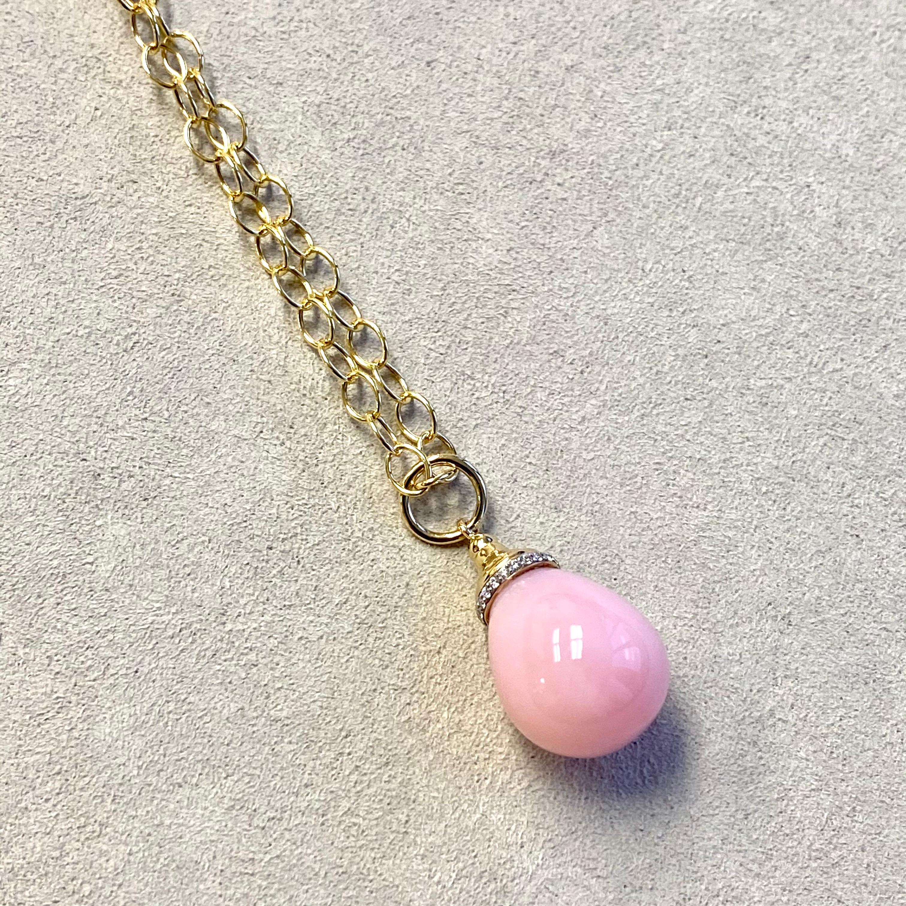 Created in 18 karat yellow gold 
Pink Opal 18 carats approx.
Diamonds 0.10 carat approx.
Chain sold separately

Fashioned from 18 karat yellow gold, this exquisite piece features a radiant pink opal of approximately 18 carats and an enchanting array