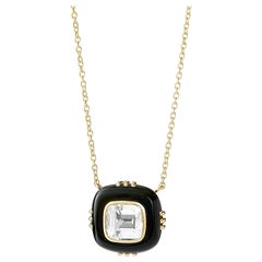Collana Syna in oro giallo con cristallo di rocca e onice nera