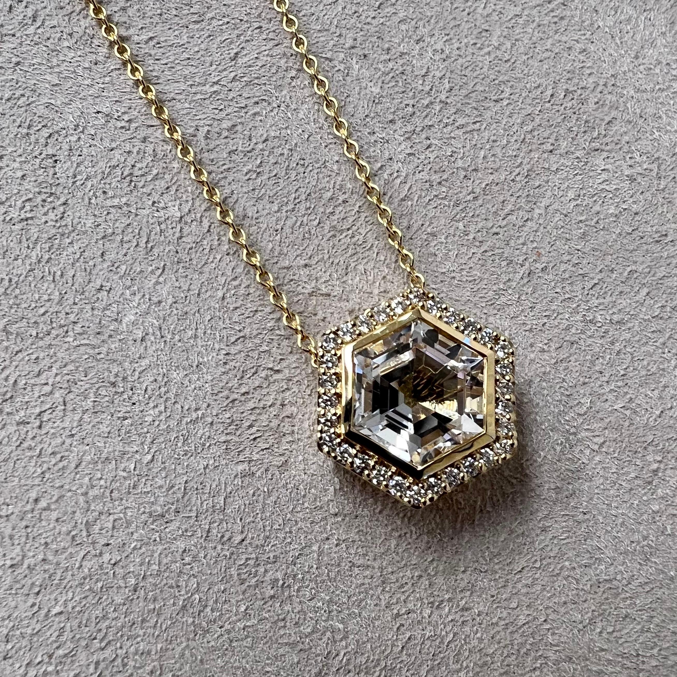 Created in 18 karat yellow gold
Rock crystal 8 carats approx.
Diamonds 0.35 carat approx.
18 inch, adjustable at 16-17
Limited edition

Crafted from 18 karat yellow gold, this limited edition necklace features a dazzling 8-carat Rock Crystal and
