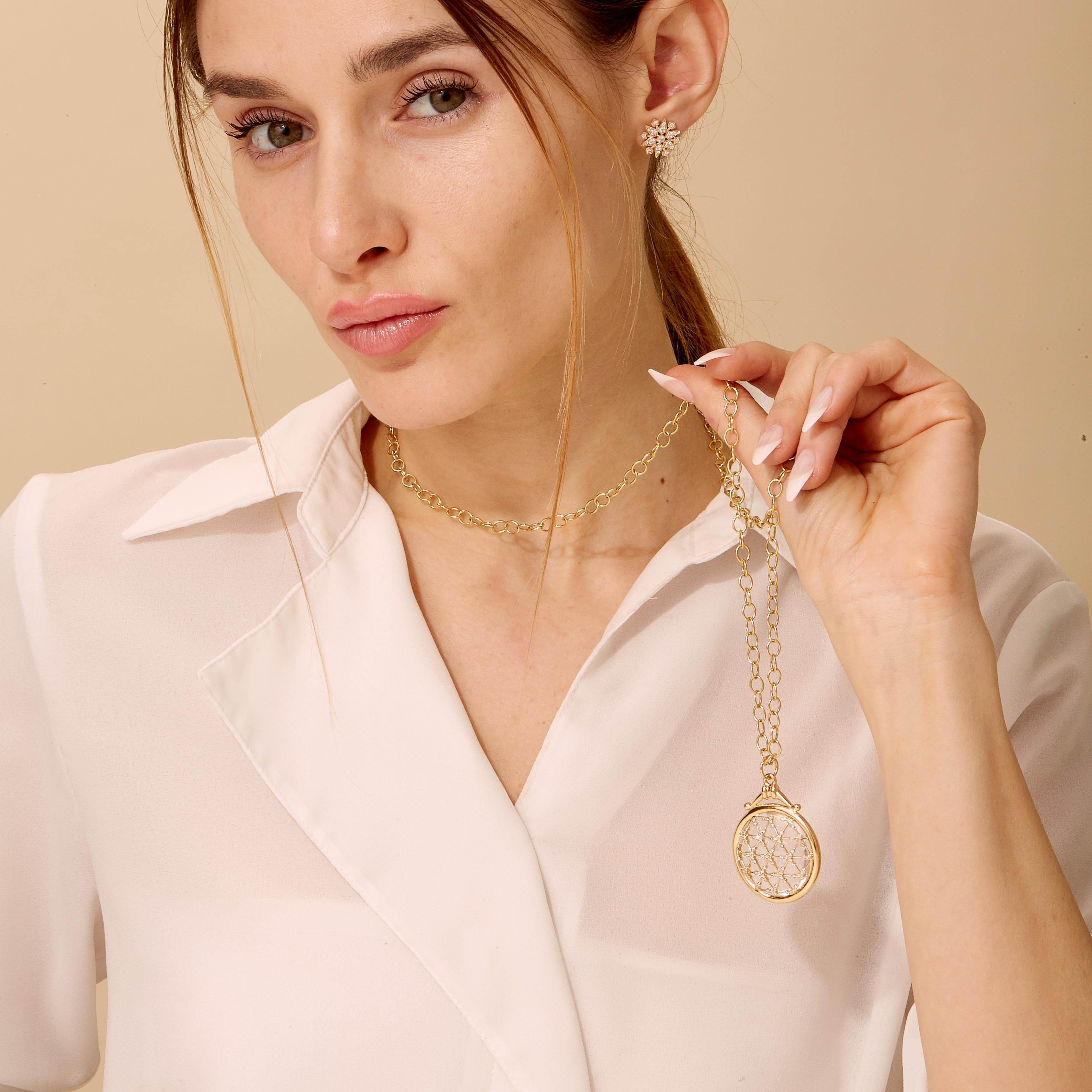Created in 18 karat yellow gold
Rock crystal 45 carats approx.
Diamonds 0.50 carat approx.
Chain sold separately
Limited edition

Crafted from 18-karat yellow gold, the Candy Gem Sugarloaf Necklace features a stunning rock crystal of approximately