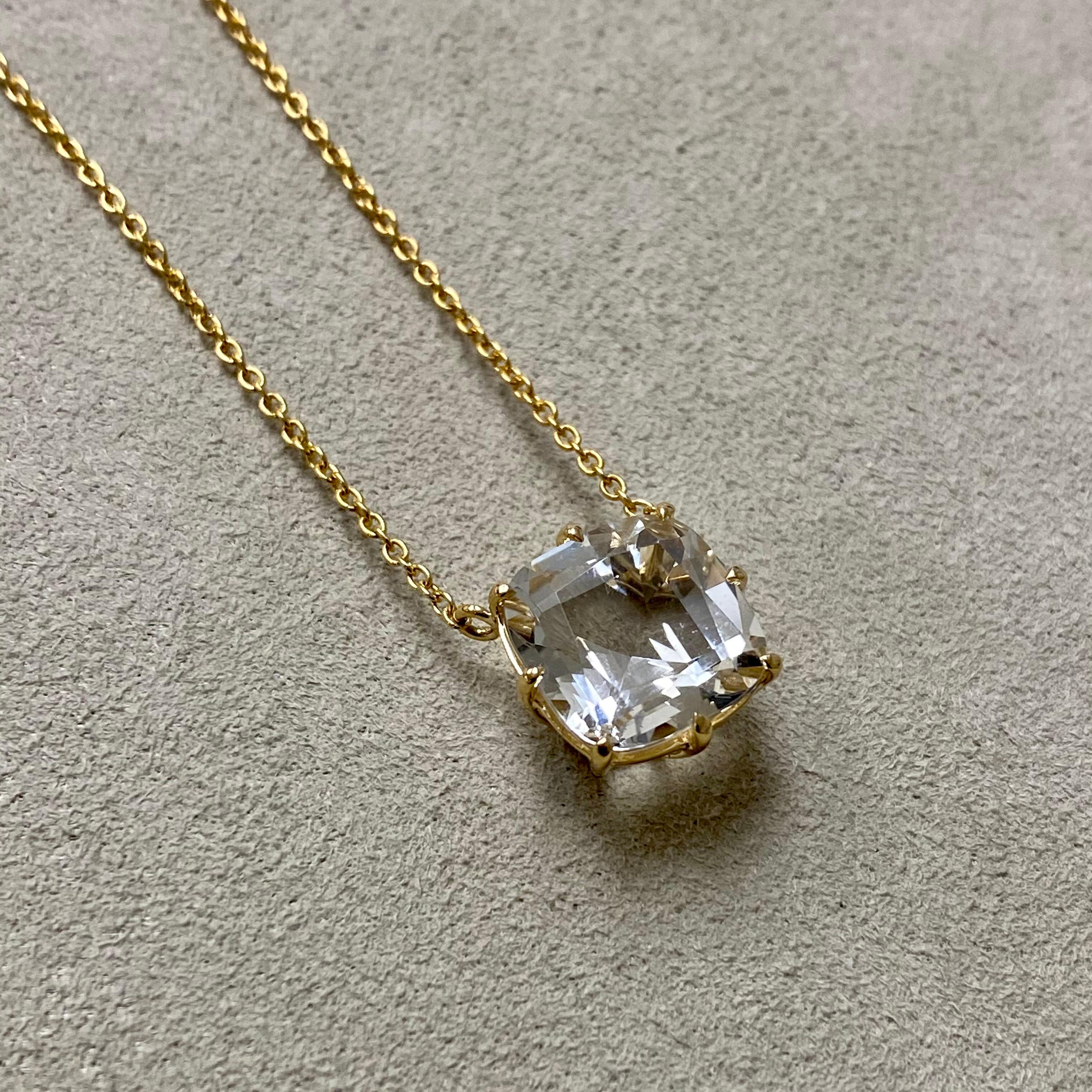 Created in 18 karat yellow gold
Rock Crystal 4 carats
18 inch chain with loops at 16th and 17th inch

Crafted from 18 karat yellow gold, this stunning necklace showcases a rock crystal of 4 carats, suspended from an 18 inch chain featuring loops at