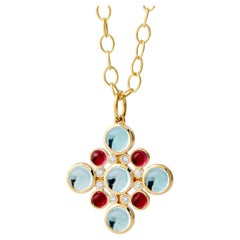 Pendentif Syna en or jaune, rubellite et topaze bleue avec diamants