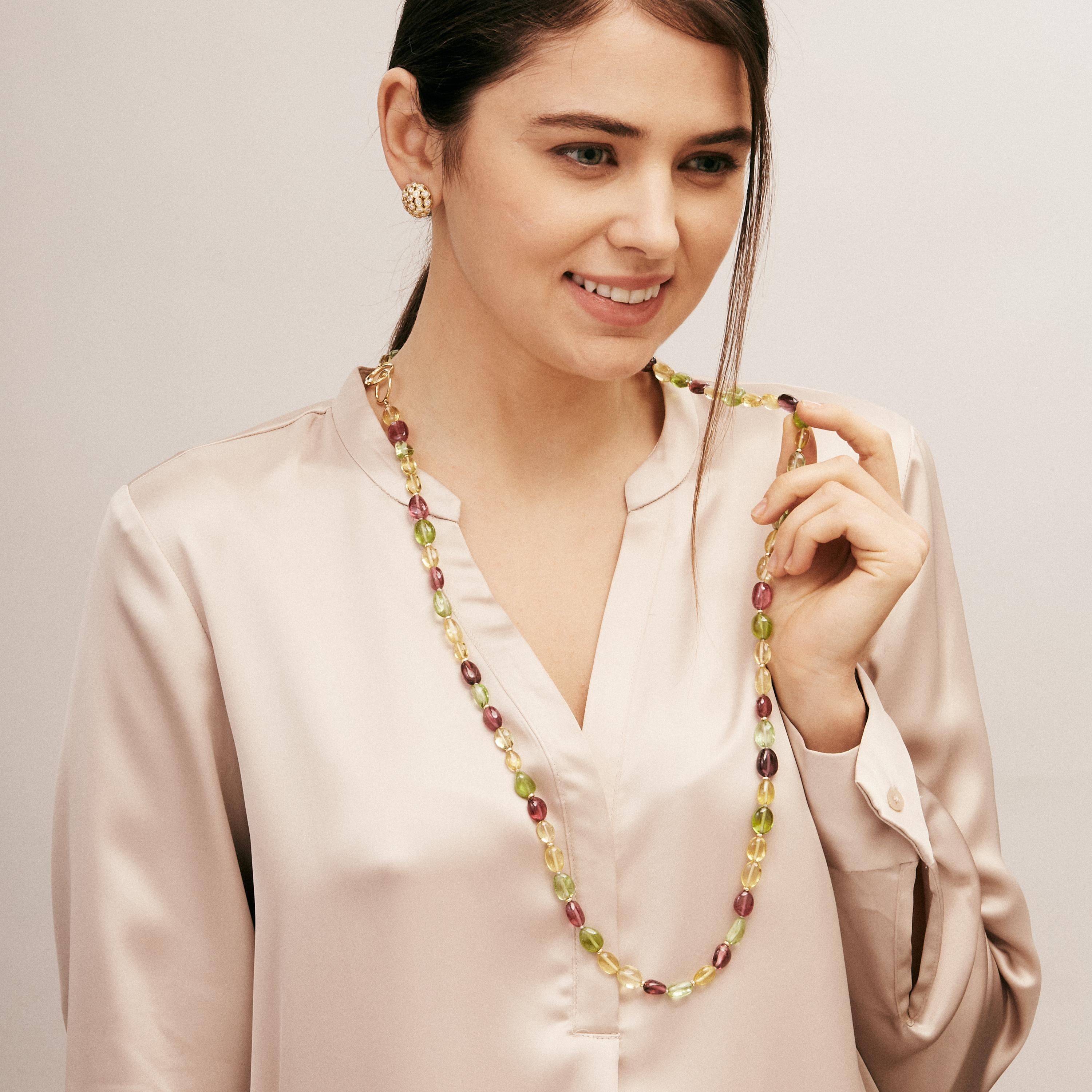 Created in 18 karat yellow gold
36 inch length
Rubellite, yellow beryl and peridot beads
18kyg small toggle clasp
Limited edition

Crafted of 18 karat yellow gold, this limited-edition necklace features a 36-inch chain adorned with rubellite, yellow