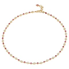 Collana Syna in oro giallo con fiori di rubini e diamanti