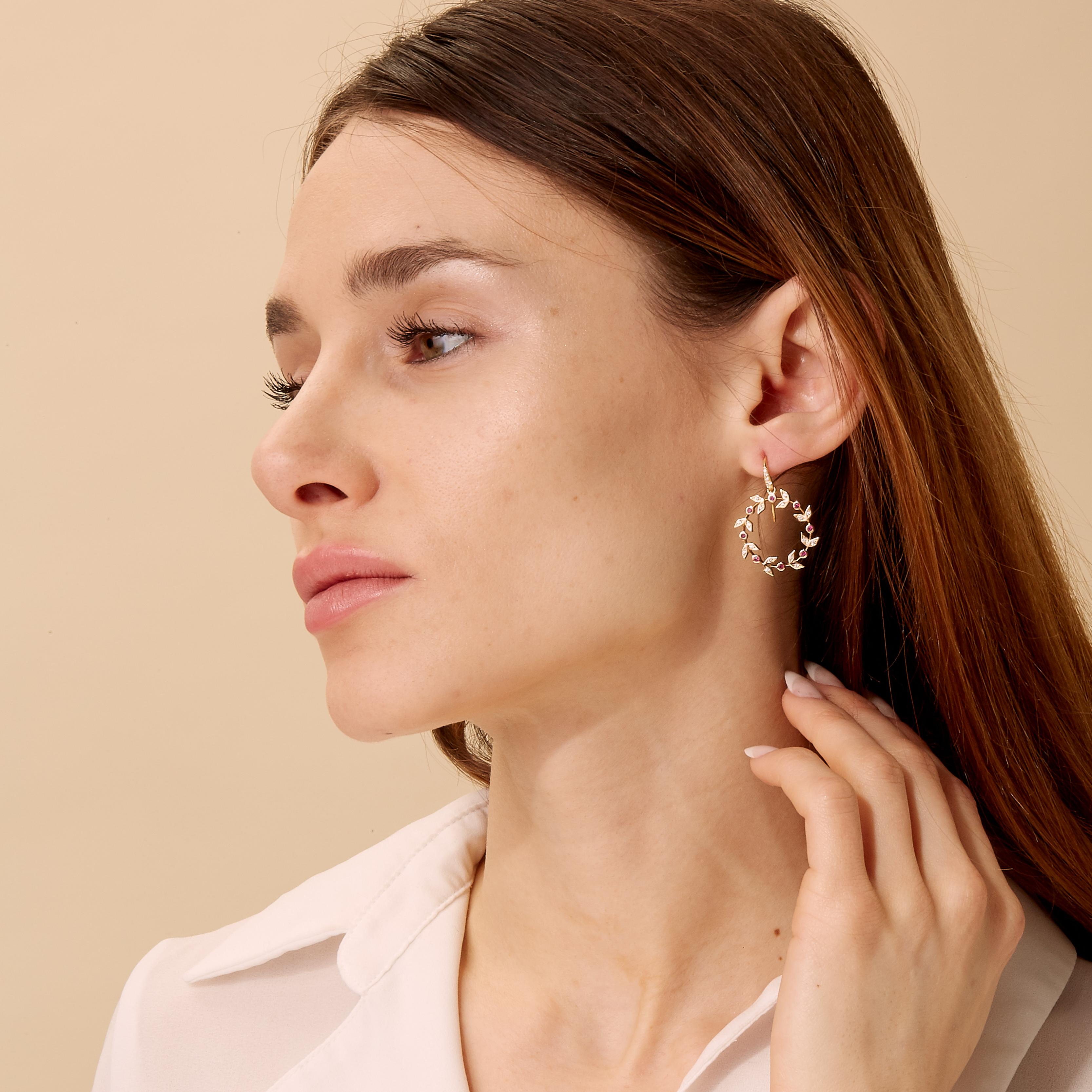 Created in 18kyg
Rubies 0.35 carat approx.
Diamonds 0.30 carat approx.
Limited edition

Adorn yourself with exquisite elegance with these exquisite Candy Blue Topaz and Moon Quartz Earrings, created in 18kyg. Embellished with rubies and diamonds