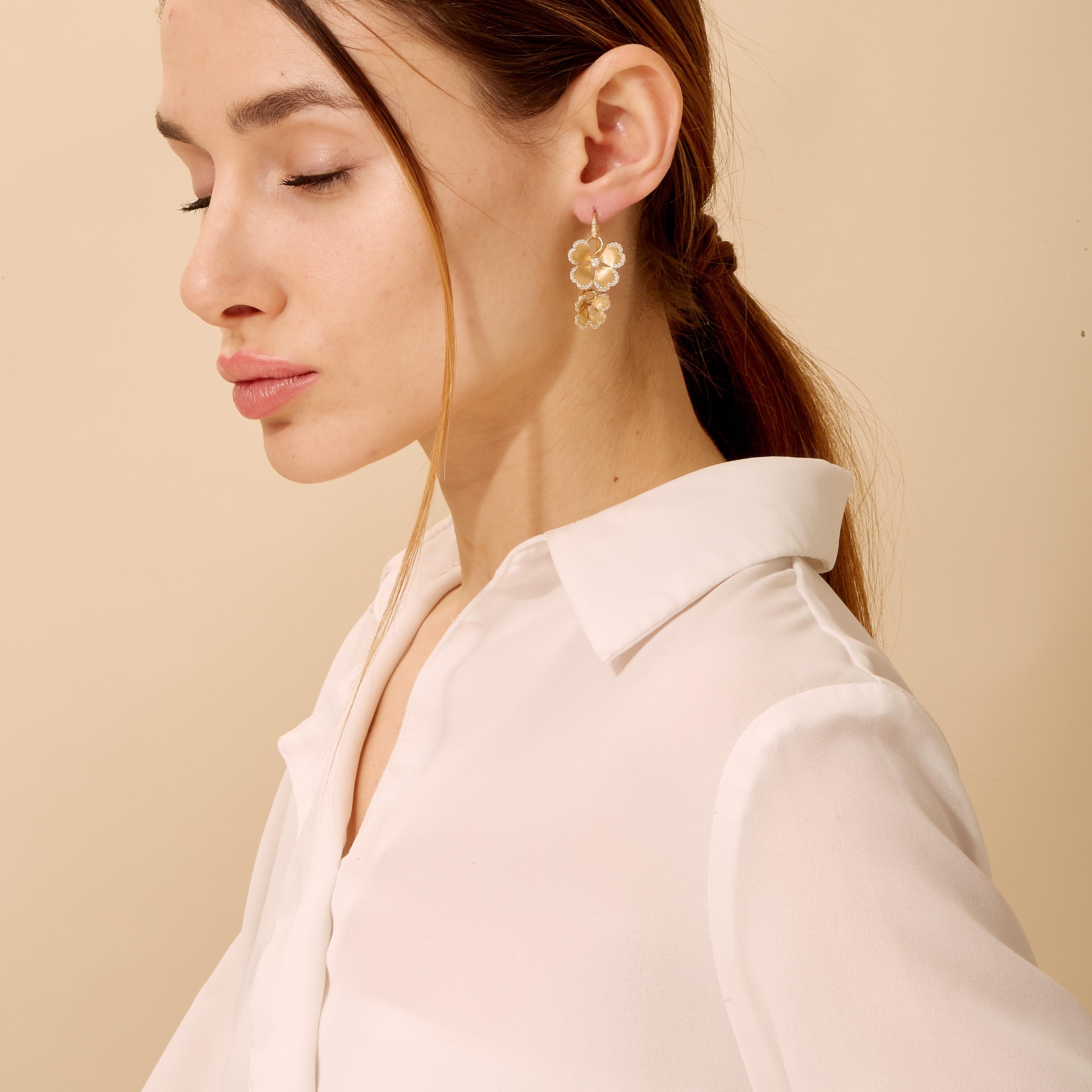 Created in 18 karat yellow gold
Diamonds 1.10 carats approx.
French wire for pierced ears
Limited edition

Exquisitely worked in 18 karat yellow gold, these earrings feature a limited edition design encrusted with an approximate aggregate of 1.10