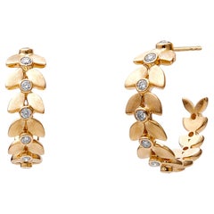 Pendientes de aro Hoja Satinada de Oro Amarillo Syna con Diamantes