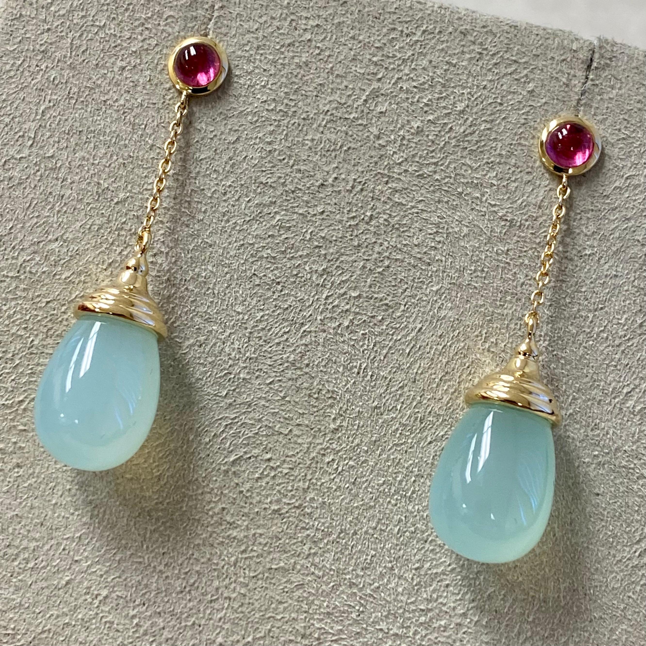 Created in 18 karat yellow gold
Sea Green Chalcedony Drops 20 carats approx.
Rubellite cabochons 0.50 carat approx.
18kyg butterfly backs

Crafted from 18 karat yellow gold, these earrings feature Sea Green Chalcedony Drops of approx. 20 carats and