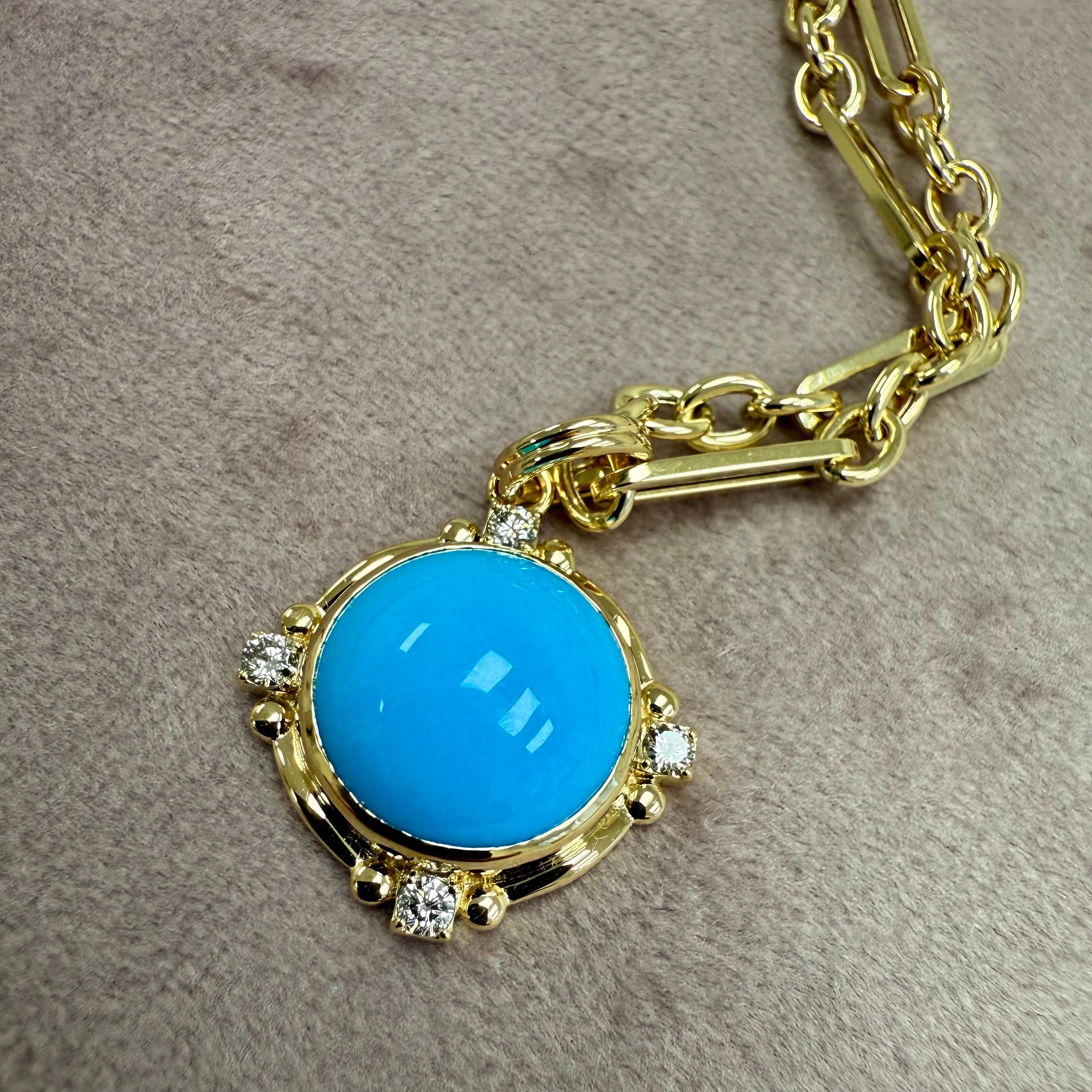 Créé en or jaune 18 carats
Turquoise Sleeping Beauty 8 carats approx.
Diamants 0,10 carat environ
Chaîne vendue séparément
Edition limitée




 À propos des concepteurs ~ Dharmesh & Namrata

S'inspirant de petites choses, Jewell et Namrata Kothari