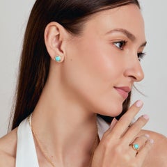 Anillo de Syna en oro amarillo con turquesa «La Bella Durmiente» y diamantes