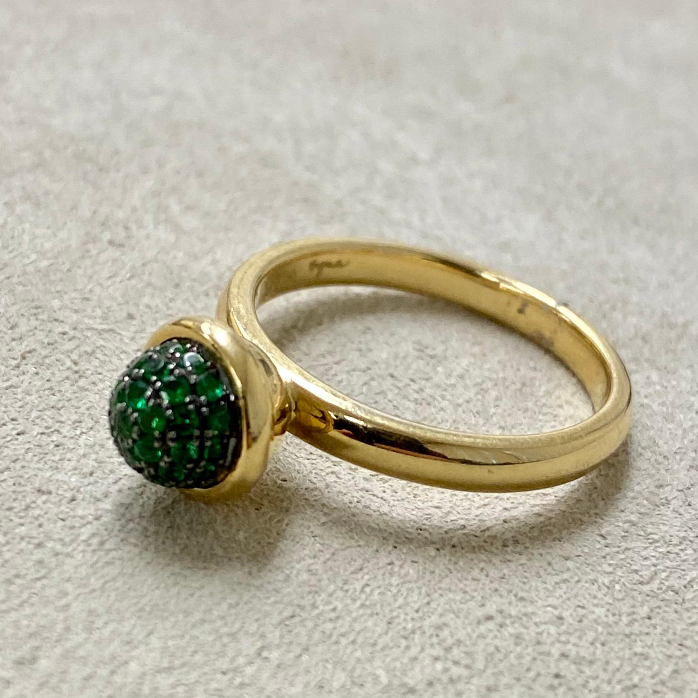 Created in 18 karat yellow gold
Tsavorite 0.30 carat approx.
Tsavorite pave ring 8 mm diameter approx.
Ring size US 6.5, can be sized upon request.

18 karat yellow gold, this luminescent ring boasts a 0.30 carat Tsavorite gemstone and an 8mm