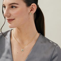 Syna Yellow Gold Starburst Pendant with Emerald and Champagne Diamonds