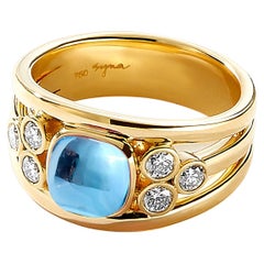 Bandeau en or jaune Syna avec topaze bleue Sugarloaf et diamants