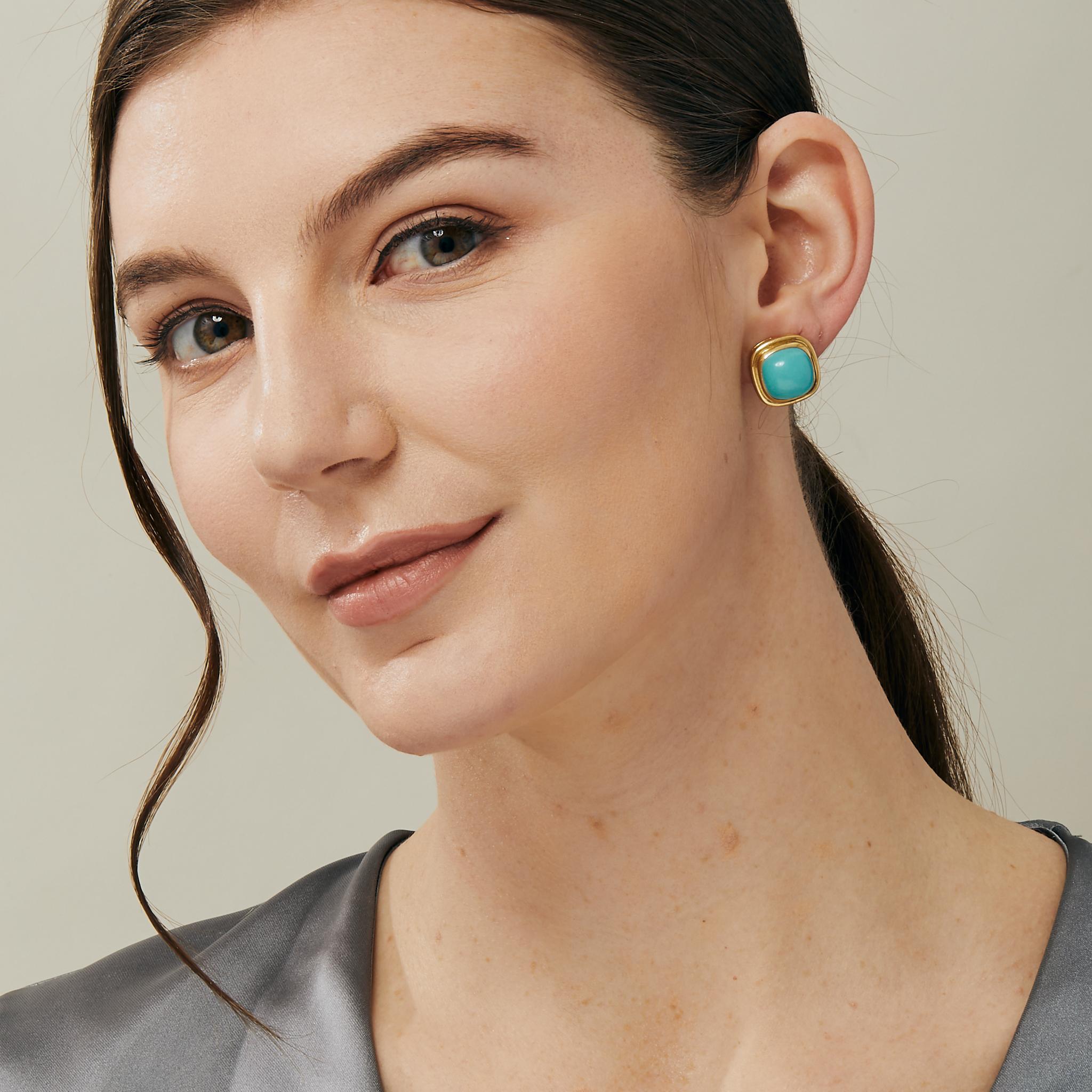 Created in 18kyg
Sleeping Beauty Turquoise
Omega clip backs
Limited edition

Crafted from 18-karat yellow gold, these limited-edition earrings boast the brilliant hues of Sleeping Beauty Turquoise and secure with Omega clip backs for enduring