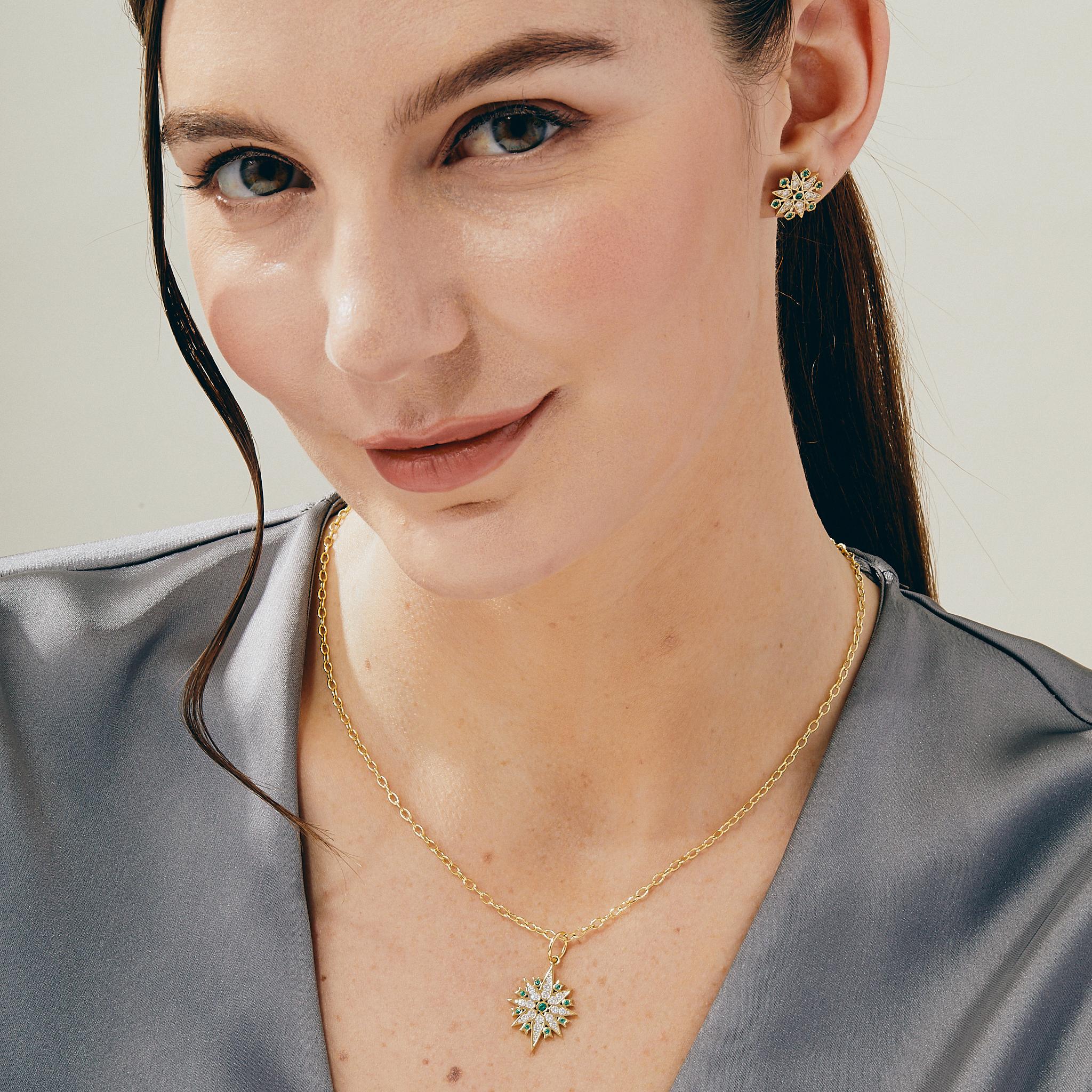 Created in 18 karat yellow gold
Emeralds 0.10 carat approx.
Diamonds 0.50 carat approx.
Limited edition
Chain sold separately

Meticulously crafted from 18 karat yellow gold, this exclusive edition pendant is encrusted with 0.10 carat emeralds and