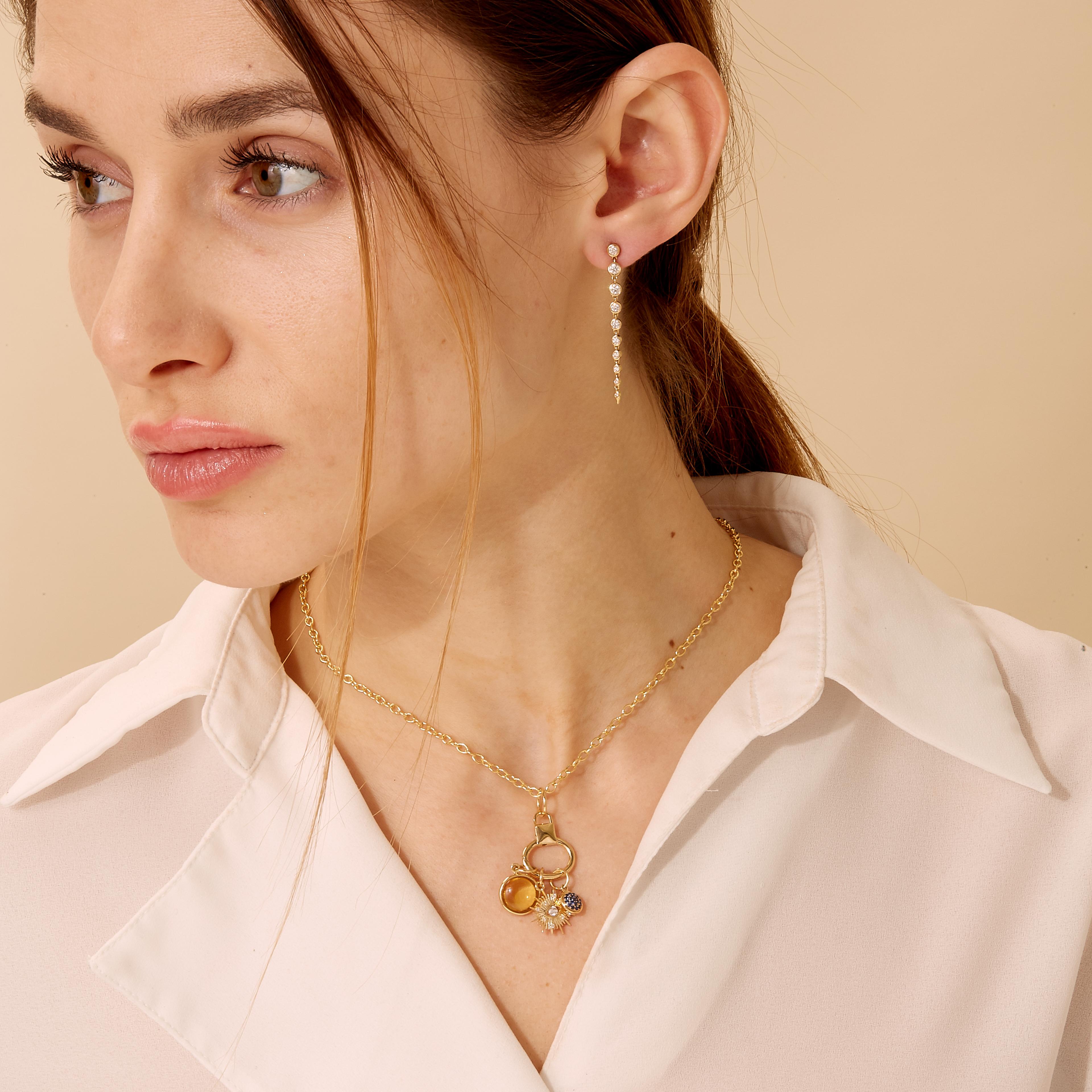 Created in 18 karat yellow gold
Citrine 3.50 carats approx.
Blue sapphire 0.10 carat approx.
Champagne diamonds 0.10 carat approx.
18 inch, adjustable at 16-17
Limited edition

Crafted from 18 karat yellow gold, this limited edition necklace