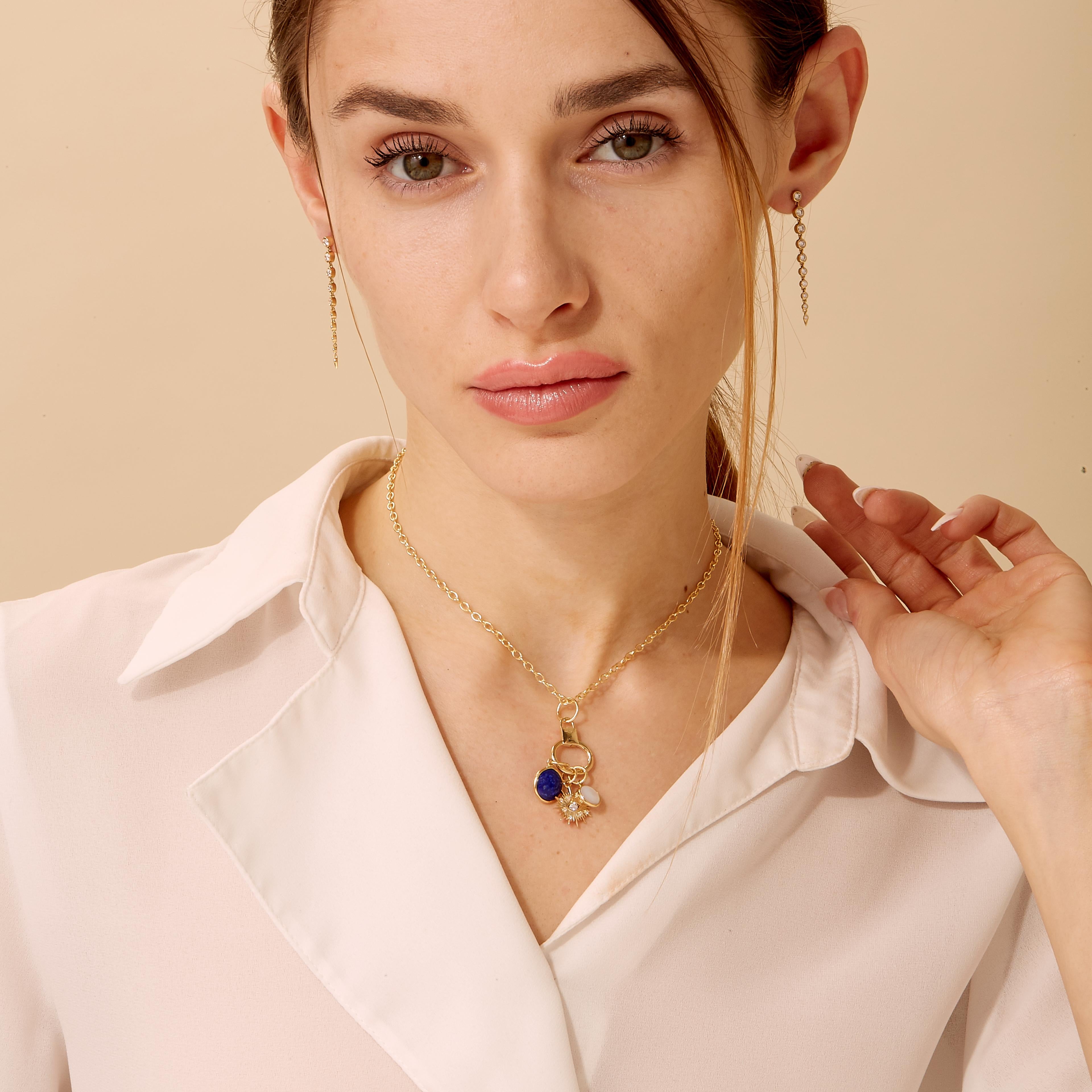 Created in 18 karat yellow gold
Lapis lazuli 3.50 carats approx.
Mother of pearl 1.40 carats approx.
Diamond 0.10 carat approx.
18 inch, adjustable at 16-17
Limited edition

Exquisitely crafted in 18 karat yellow gold, this limited edition necklace