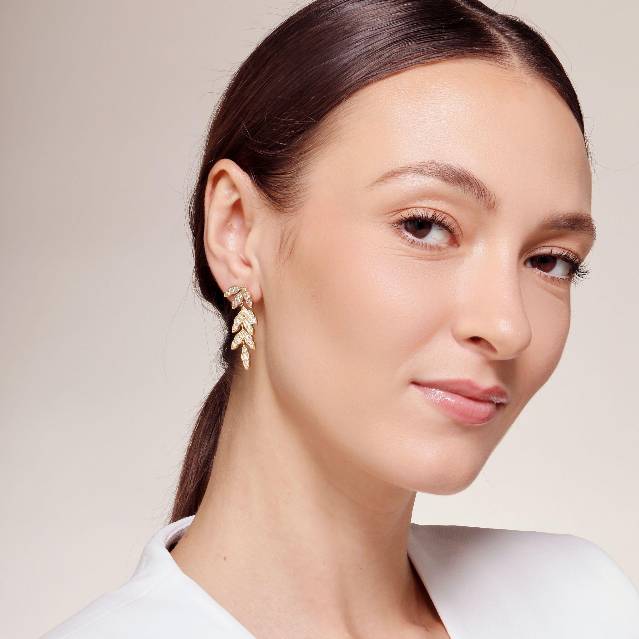 Created in 18 karat yellow gold
Diamonds 2 carats approx.
Post backs for pierced ears

Elevate your look with these exquisite 18 karat yellow gold earrings. Sparkling 2 carat diamonds are perfectly complemented by dazzling candy blue topaz and lemon
