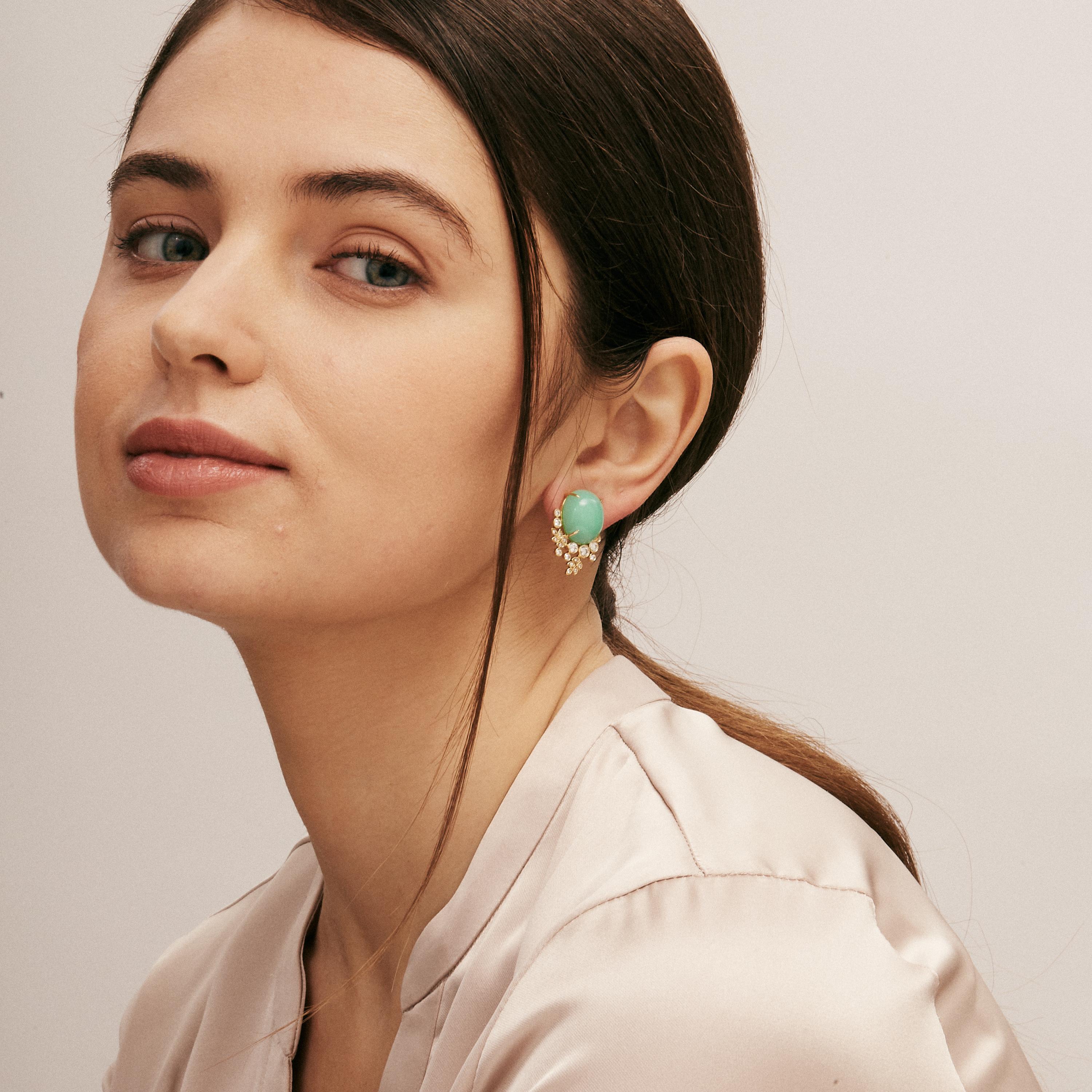 Created in 18 karat yellow gold
Chrysoprase 18 carats approx.
Diamonds 0.70 carat approx.
Omega clip-backs & posts
Limited Edition

Enchant your ears with these limited edition Candy Blue Topaz and Lemon Quartz Sugarloaf Earrings. Crafted in 18