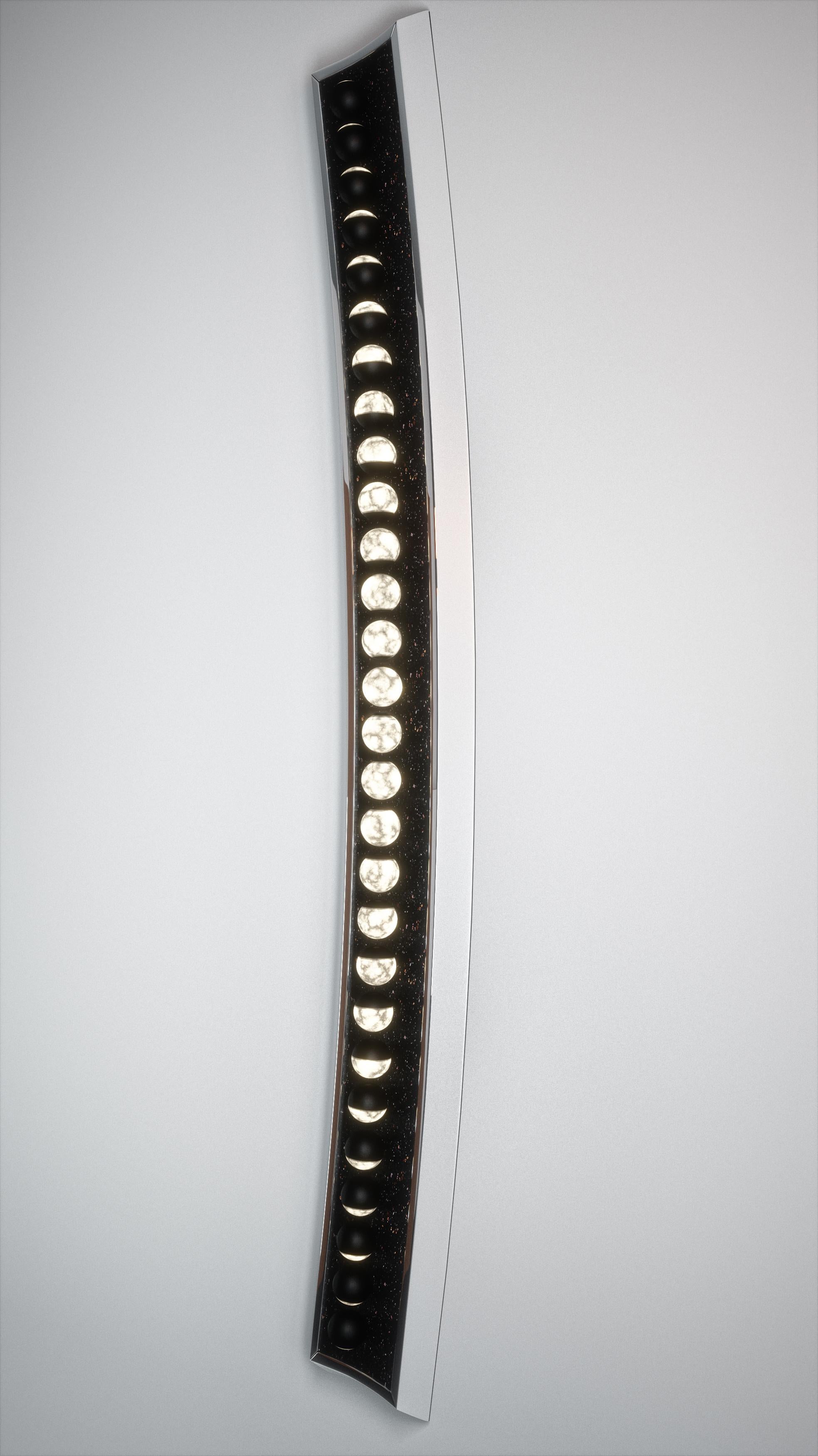 Synodic sconce:
Nightlight brings mankind in touch with the mysteries of space and the farther reaches of the universe. The moon, traditionally our principal source of nightlight, can evoke strong emotions- from fear and terror to peace and