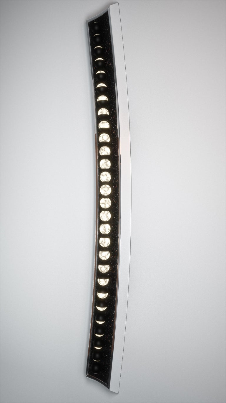 Synodic sconce:
Nightlight brings mankind in touch with the mysteries of space and the farther reaches of the universe. The moon, traditionally our principal source of nightlight, can evoke strong emotions- from fear and terror to peace and