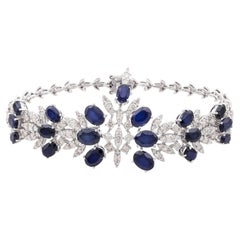 Bracelet de pierres précieuses bleues traitées et pavées de diamants naturels en or blanc 18 carats