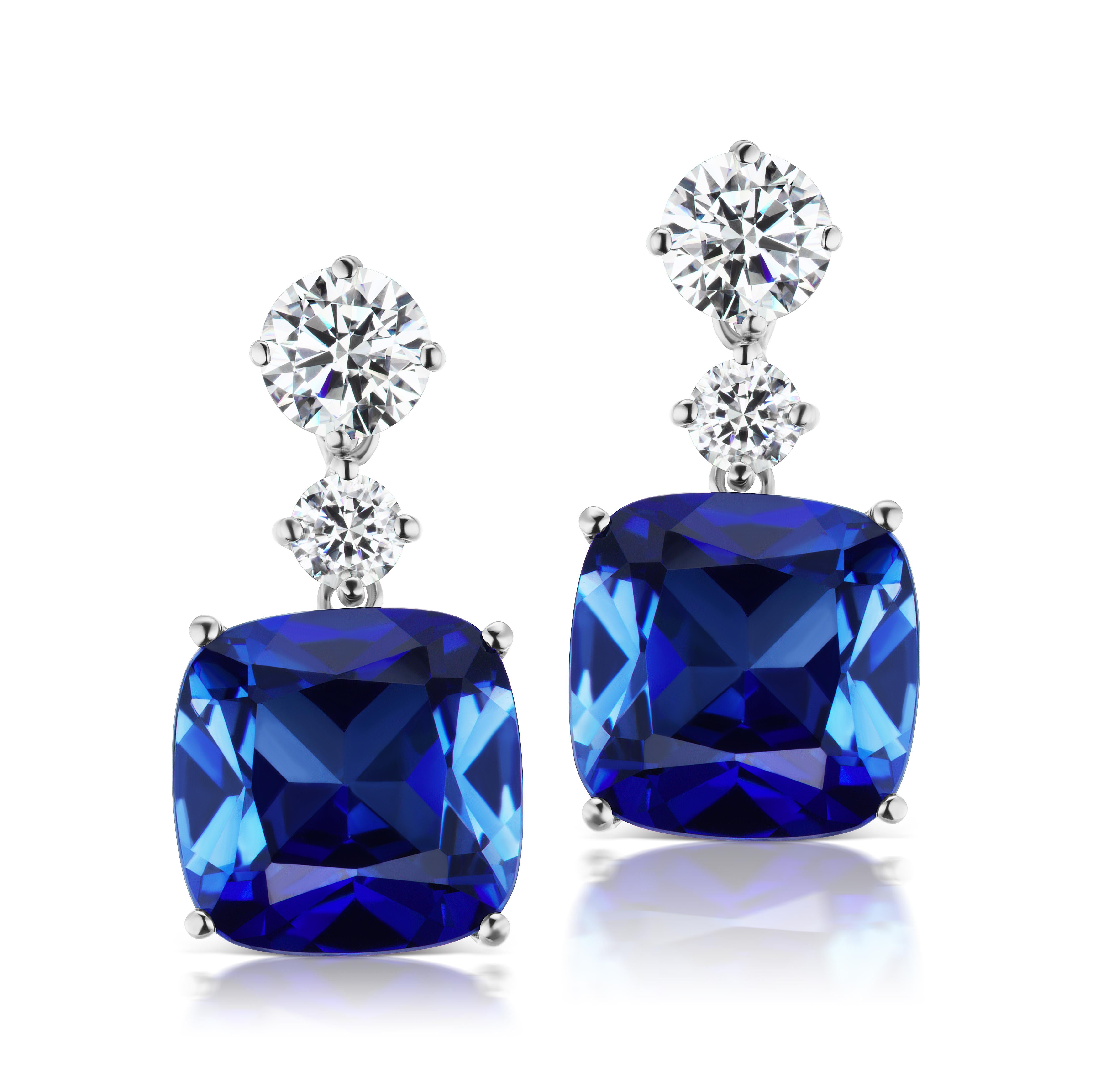 Magnificent Costume Jewelry chic faux six carat cushion sapphire drop earrings post only set in rhodium sterling finest quality.