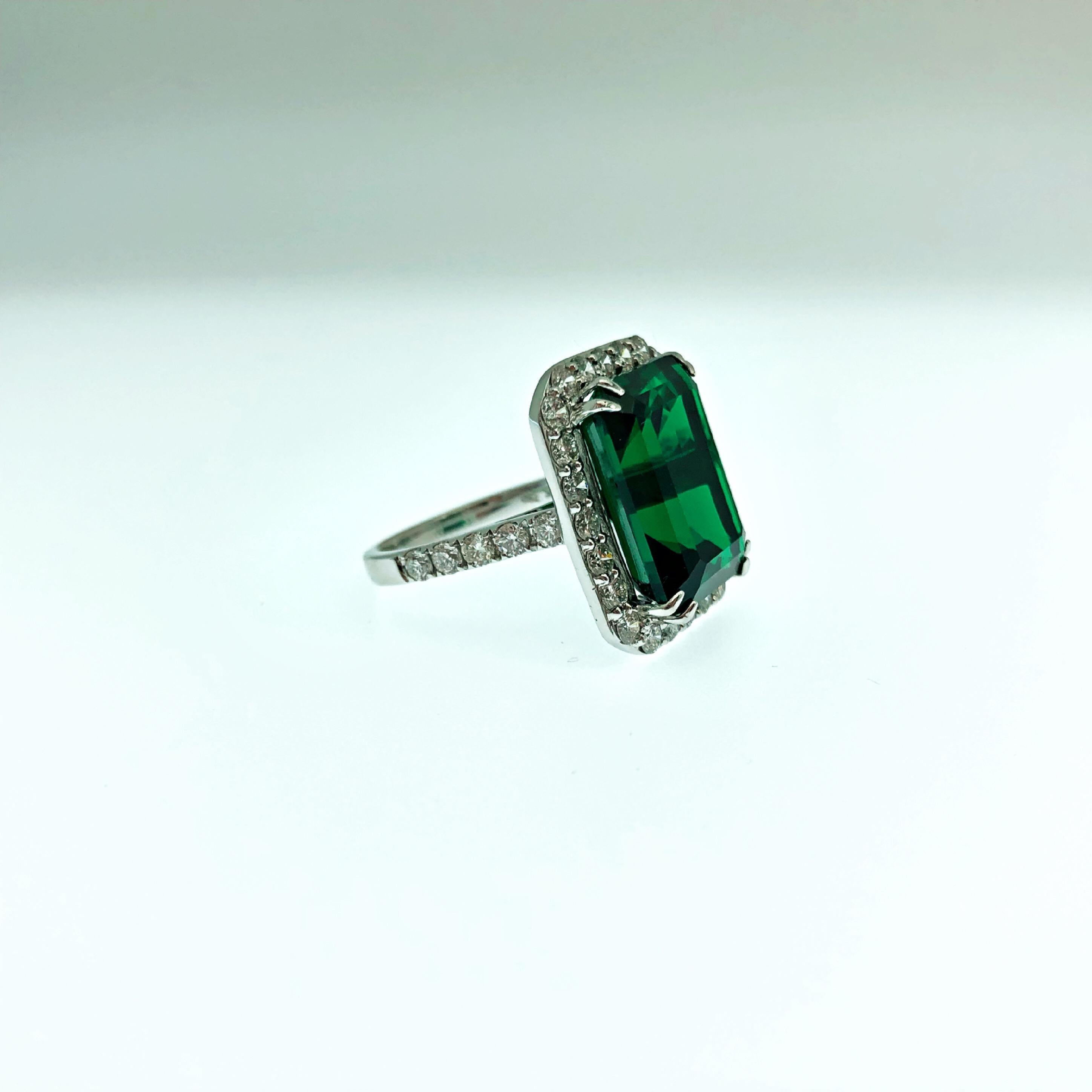 It doesn't get any more classy and elegant than this!
Large cocktail ring featuring a LAB grown synthetic deep vivid green emerald of 13.51ct and brilliant cut natural diamonds of 1.63ct.
The perfect statement ring for your next event, sparkly