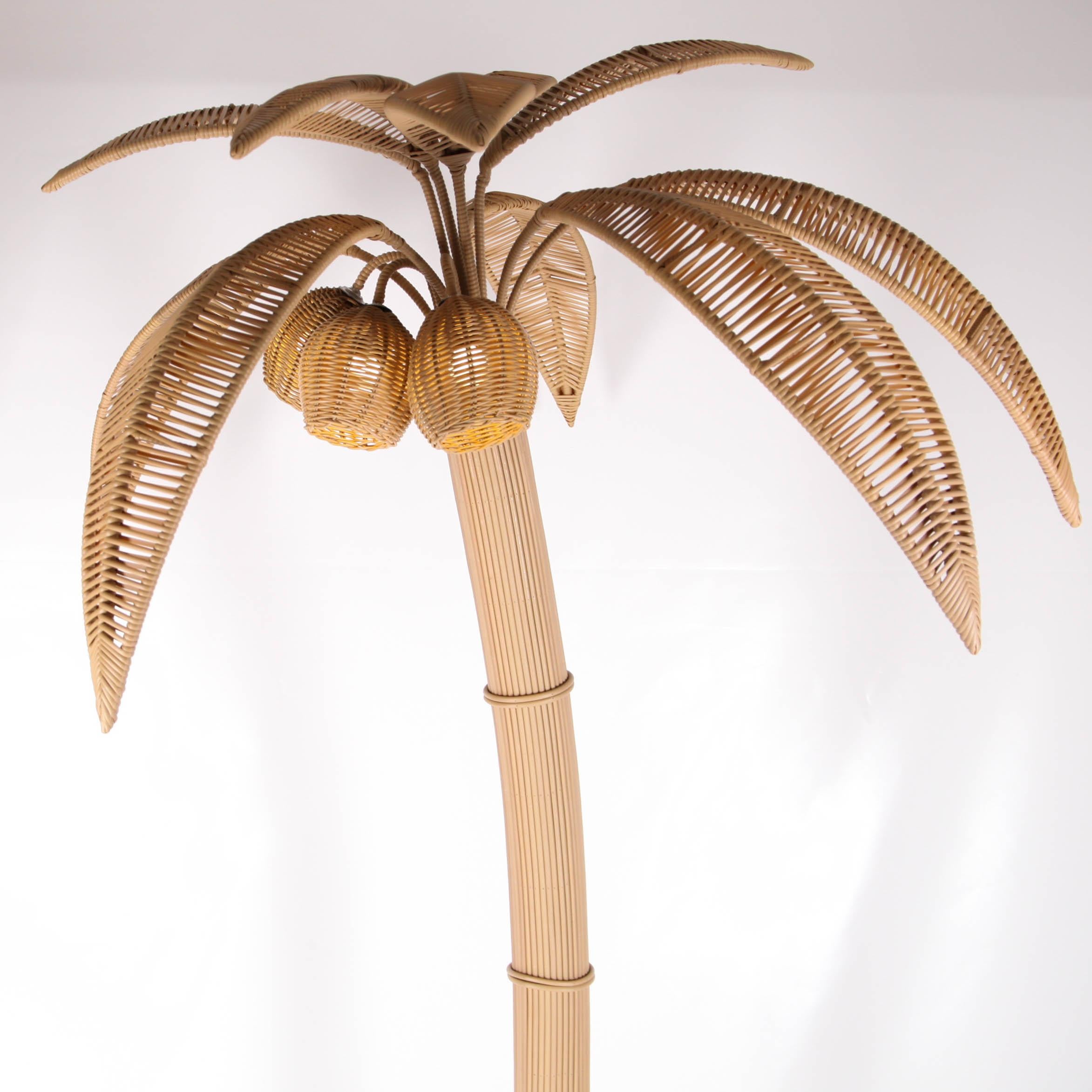Handmade synthetic rattan coconut tree / palm tree floorlamp for outdoor and/or indoor use. You can easily transform your garden into an exotic vibe. It comes with 3 lights (one in each coconut). The base is heavy. It can stand still in normal windy