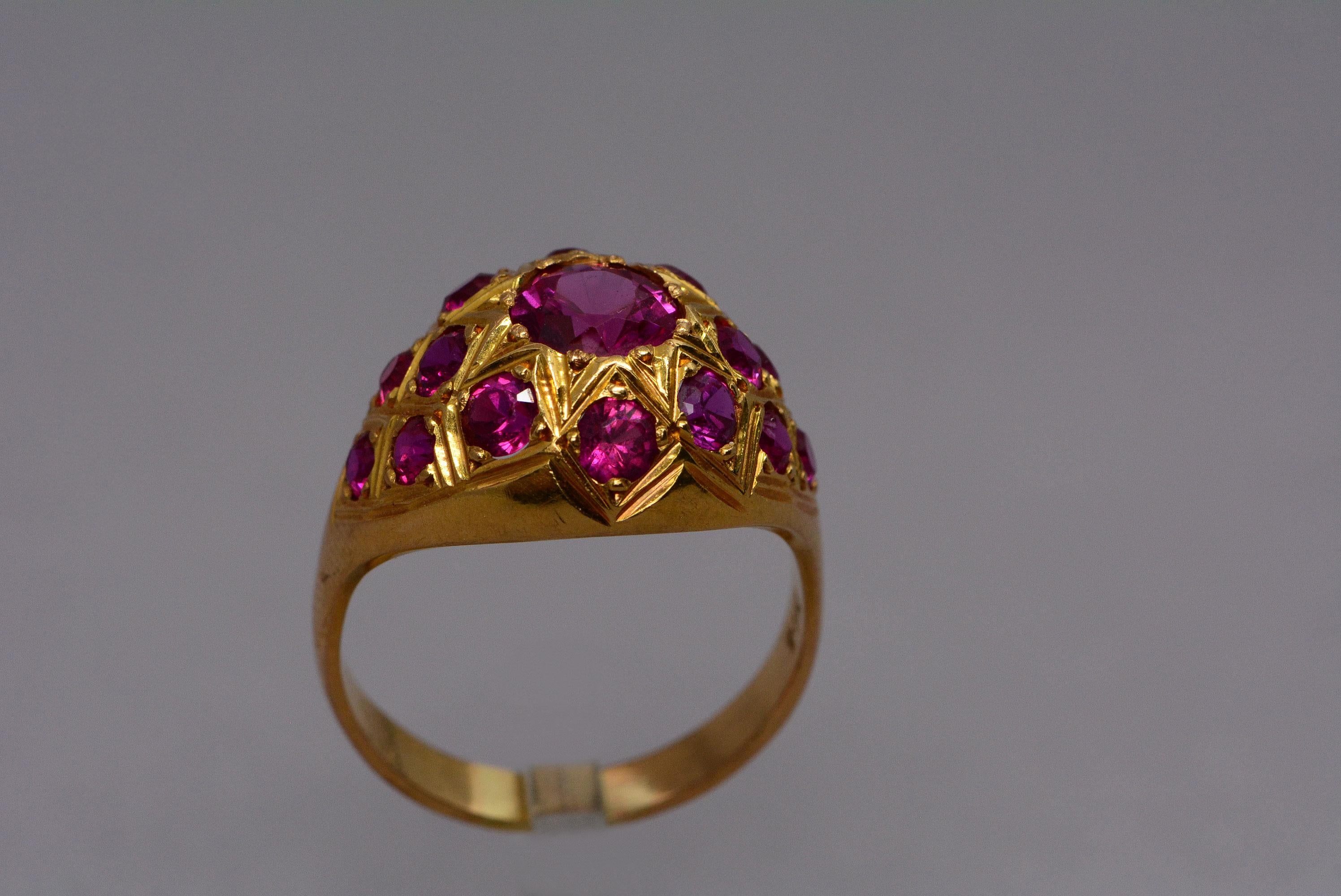 It's not often that you come across a high karat gold ring that's in such great condition for it's age or with its original gems in tact.
People always think of synthetic gemstones as less valued than natural ones, but at the time that this ring was