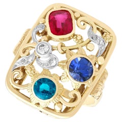 Synthetic Ruby and Sapphire 0.48 Carat Zircon 0.10 Carat Diamond Gold Ring