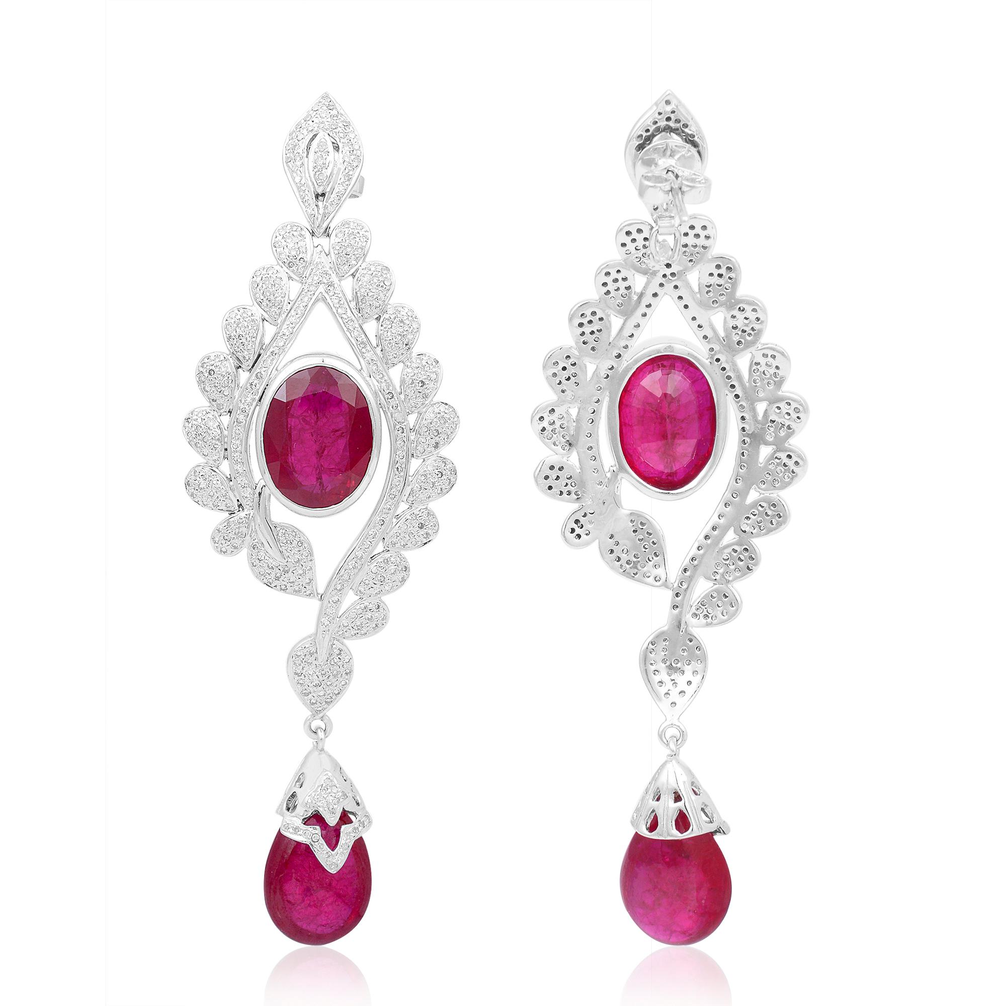 Item Code :- CNS-8119
Gross Wt. :- 34.72 gm
18k Gold Wt. :- 1.47 gm
Silver Wt. :- 23.13 Ct.
Diamond Wt. :- 2.20 Ct.
Synthetic Ruby Wt. :- 48.80 Ct.
Earrings Length :- 81 mm approx.
✦ Sizing
.....................
We can adjust most items to fit your